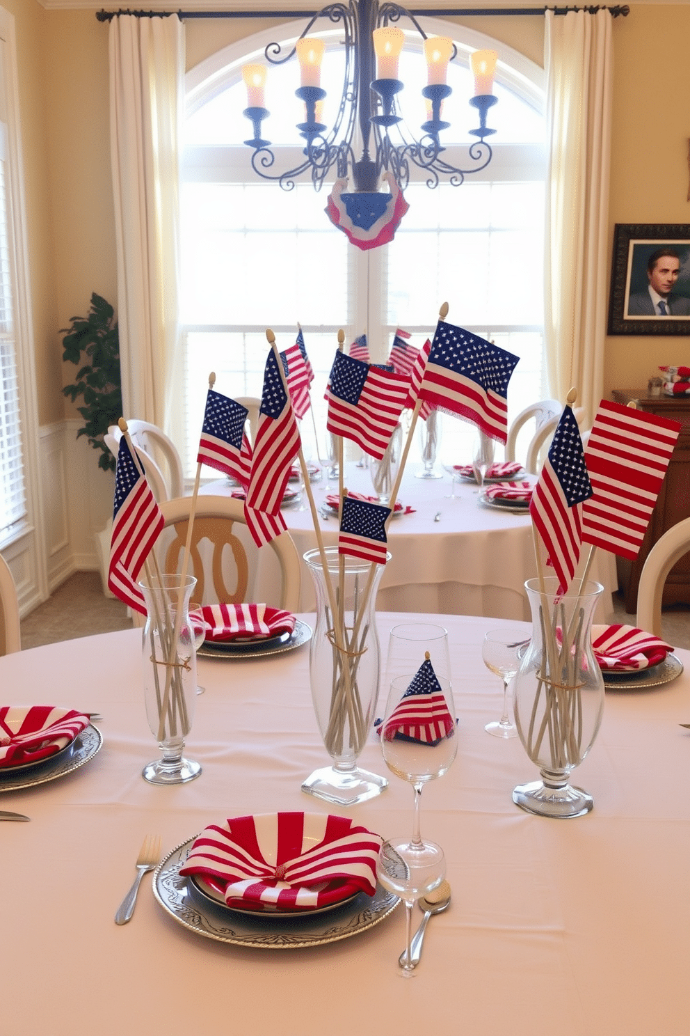 A festive dining room setting adorned with miniature flags displayed in elegant glass vases. The table is set with a red, white, and blue color scheme, featuring a crisp white tablecloth and patriotic-themed dinnerware.