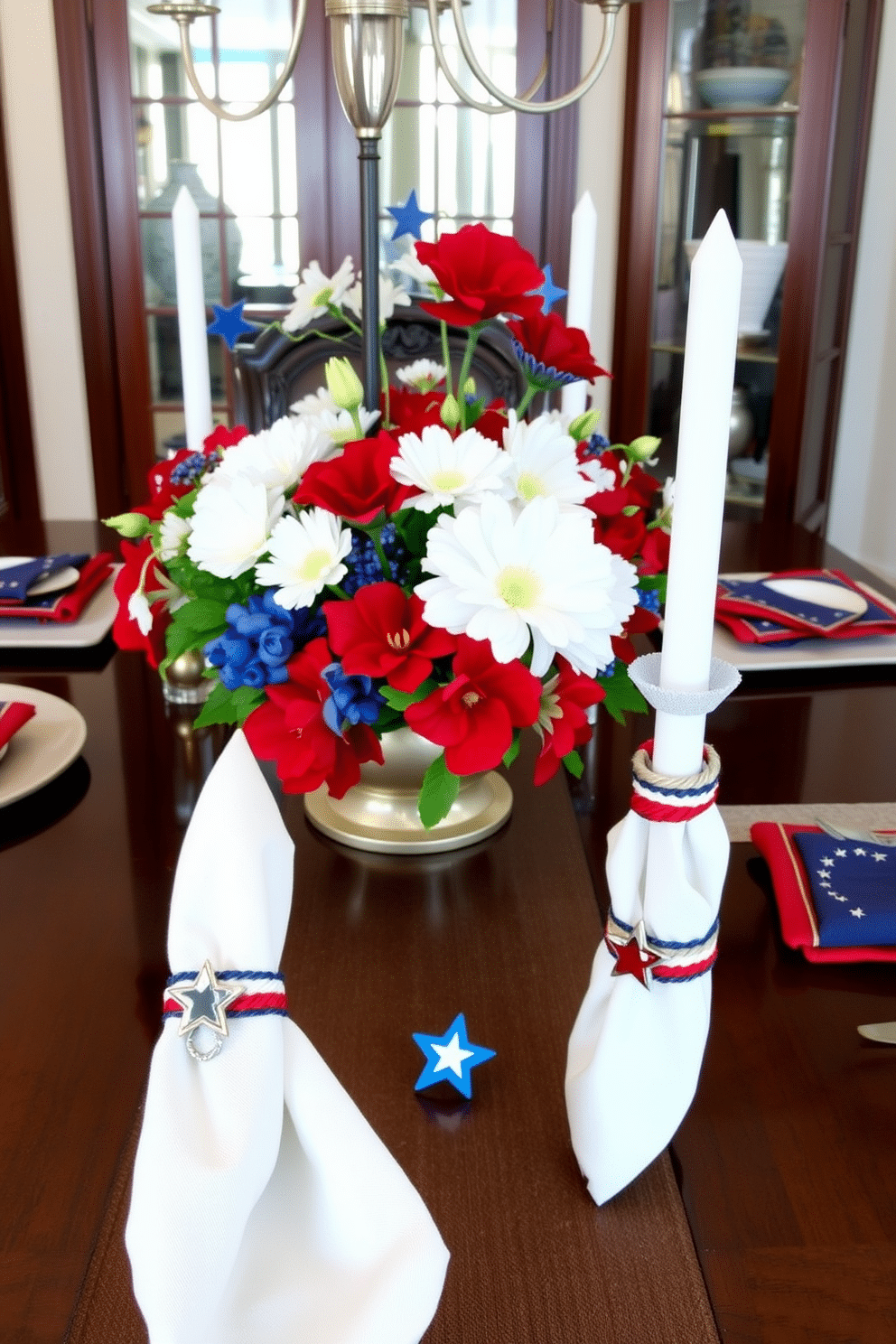 A festive dining room setting for Independence Day. The table is adorned with red white and blue decorations featuring elegant napkin rings designed with stars and stripes. Each napkin ring is crafted from natural materials and embellished with small patriotic charms. The centerpiece is a vibrant arrangement of fresh flowers in a red white and blue color scheme.