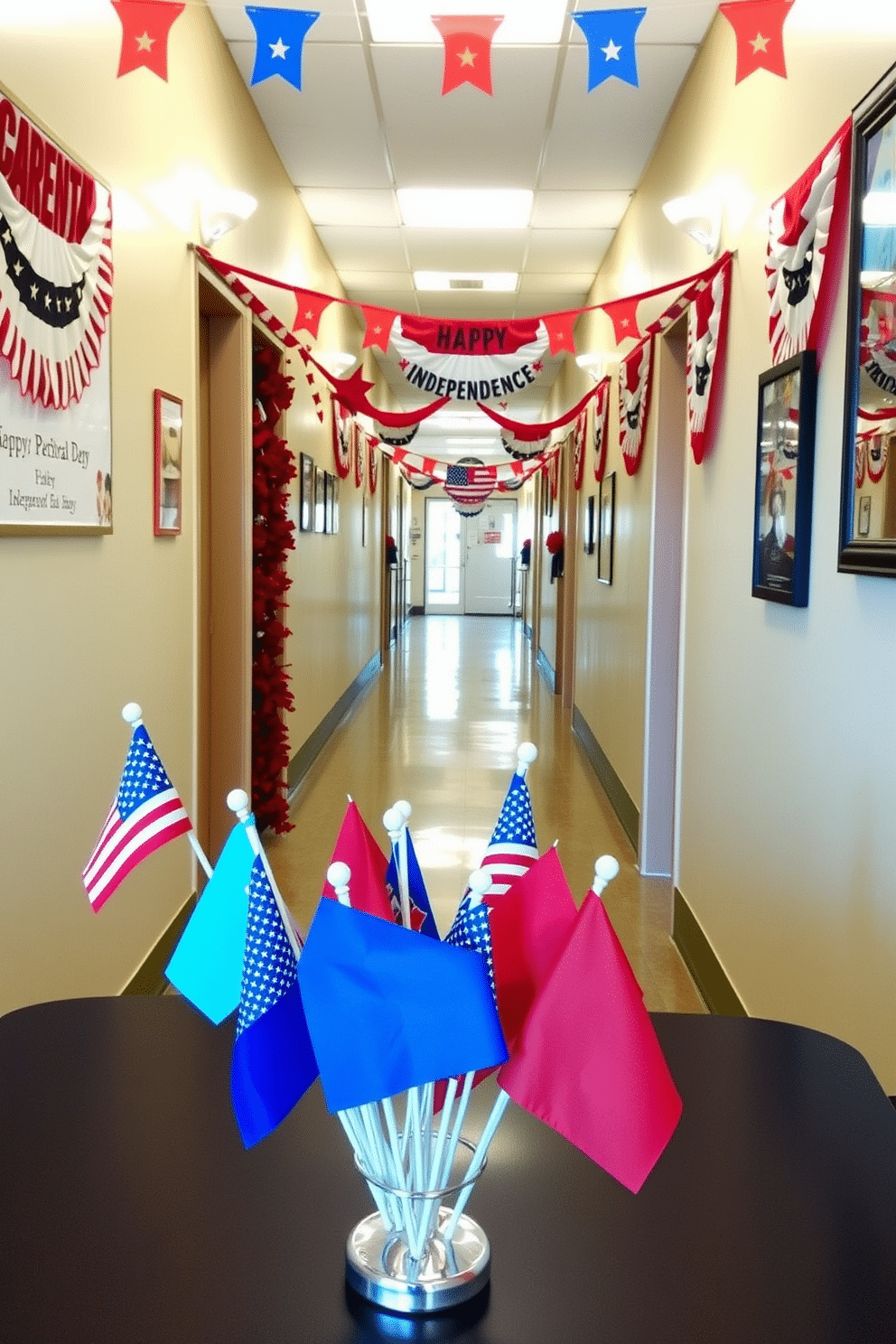 A vibrant tabletop display features miniature flags of various colors and designs, celebrating Independence Day. The flags are arranged in an artistic manner, with some standing tall while others are slightly tilted, creating a playful yet festive atmosphere. The hallway is adorned with red, white, and blue decorations that evoke the spirit of Independence Day. Banners and garlands hang from the walls, while strategically placed patriotic-themed artwork enhances the festive decor.