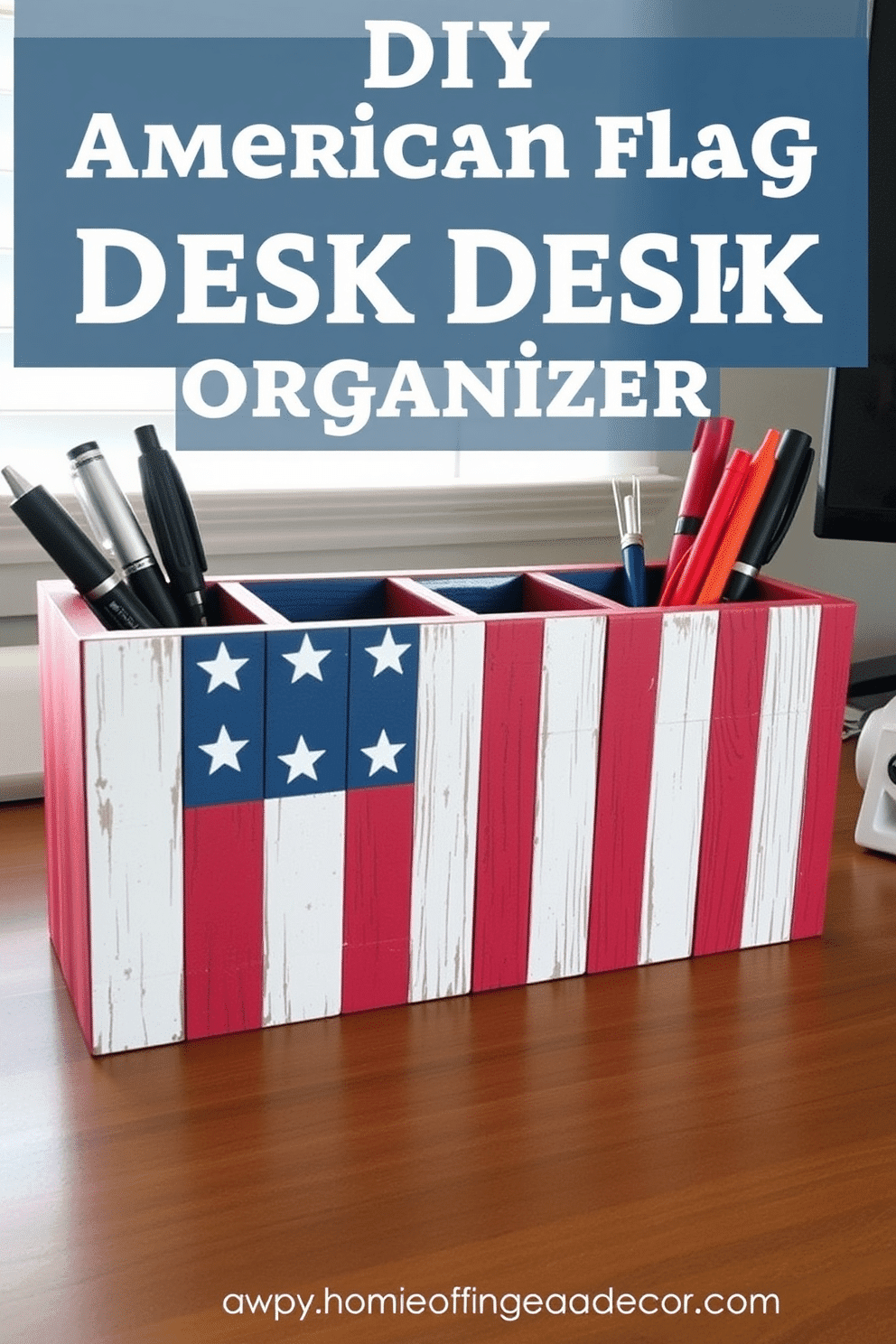 A DIY American flag desk organizer made from reclaimed wood painted in red white and blue. It features compartments for pens and office supplies with a rustic finish to add charm to your home office decor for Independence Day.