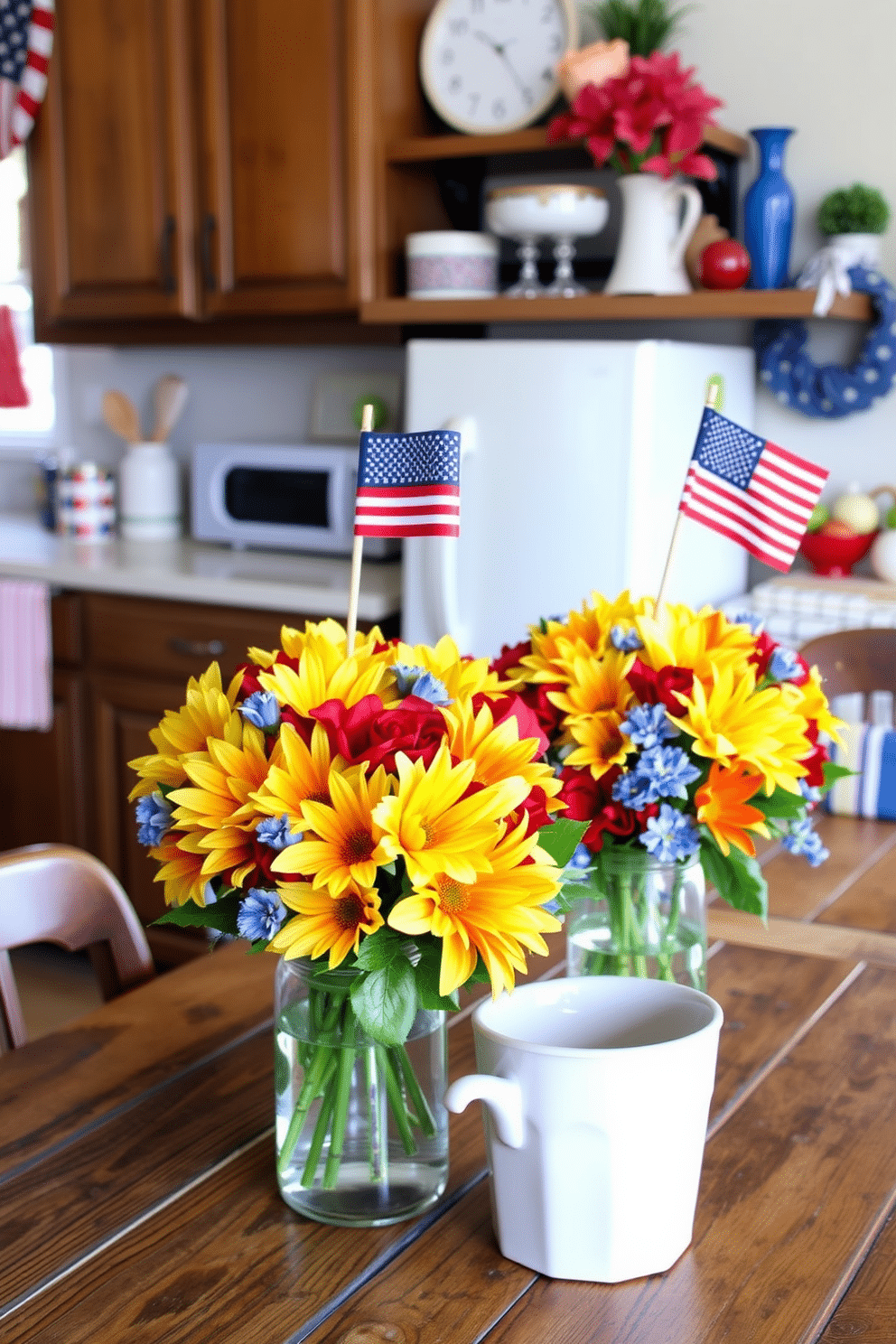 A festive kitchen setting featuring vibrant flower arrangements with miniature flags. The arrangements are placed on a rustic wooden table, complemented by red, white, and blue accents throughout the decor.