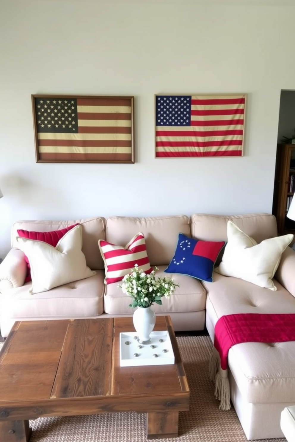 A cozy living room featuring vintage flags framed as art pieces on the walls. The decor includes a comfortable sectional sofa adorned with red, white, and blue throw pillows, complemented by a rustic coffee table made of reclaimed wood.