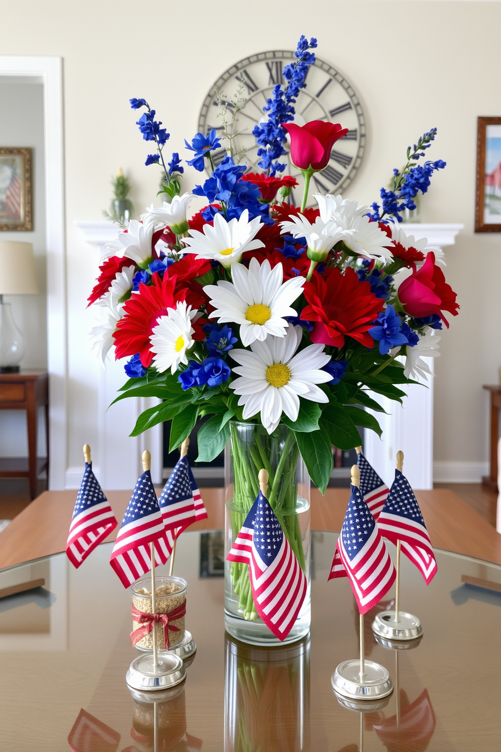 A festive table centerpiece showcasing a vibrant arrangement of red white and blue flowers in a glass vase. Surrounding the vase are small American flags placed in decorative holders adding a patriotic touch to the living room decor.