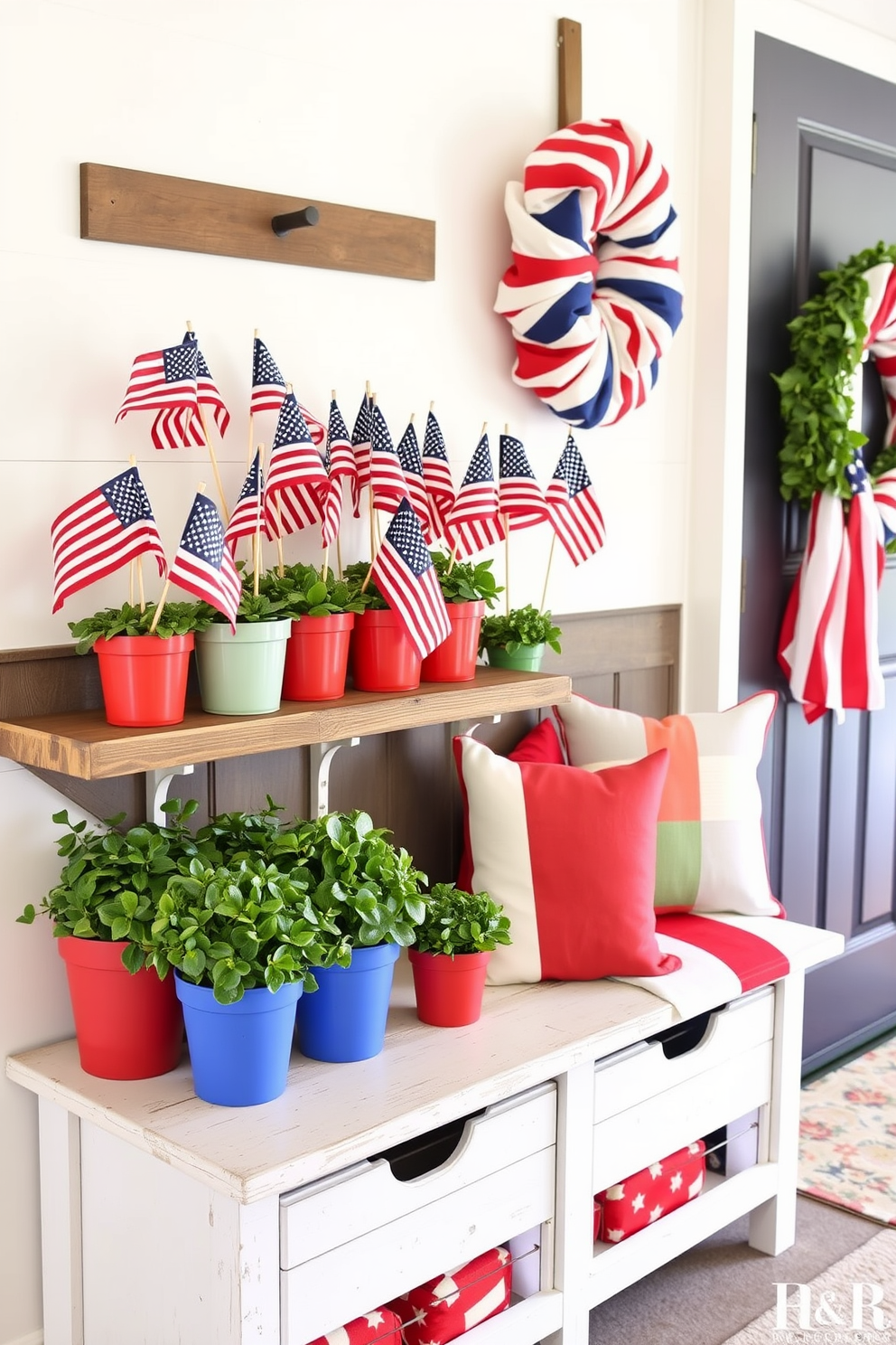 A collection of miniature flags is placed in vibrant potted plants, adding a festive touch to the space. The pots are arranged on a rustic wooden shelf, creating a cheerful display for Independence Day. The mudroom features a welcoming design with patriotic colors and decor. A bench with storage underneath is adorned with red, white, and blue cushions, while a wreath made of flags hangs on the door.