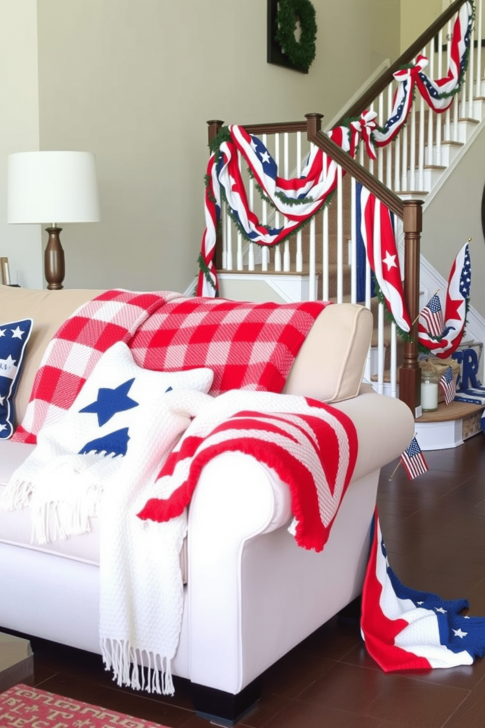 A cozy living room scene featuring seasonal throw blankets in patriotic colors draped over a plush sofa. The blankets are arranged in a way that highlights their vibrant reds, whites, and blues, creating a festive atmosphere. A beautifully decorated staircase adorned with Independence Day-themed decorations. Red, white, and blue garlands are wrapped around the banister, and small American flags are placed along the steps for an inviting celebration of patriotism.