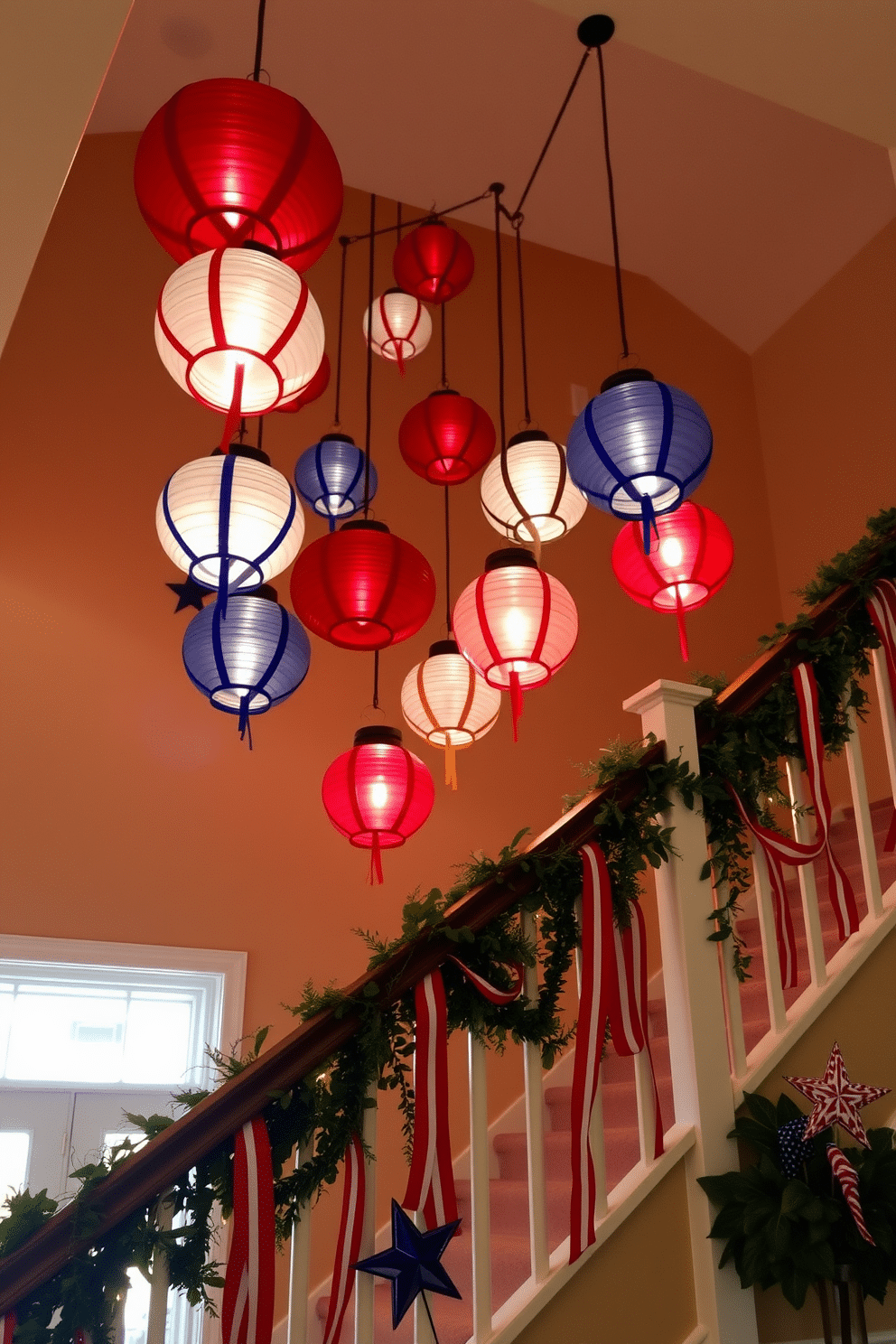 Hanging lanterns in red white and blue are suspended from the ceiling creating a festive atmosphere. The staircase is adorned with garlands of greenery intertwined with ribbons in patriotic colors adding a vibrant touch. The lanterns cast a warm glow illuminating the staircase as guests ascend. Decorative stars and stripes are placed along the railing enhancing the Independence Day theme throughout the space.