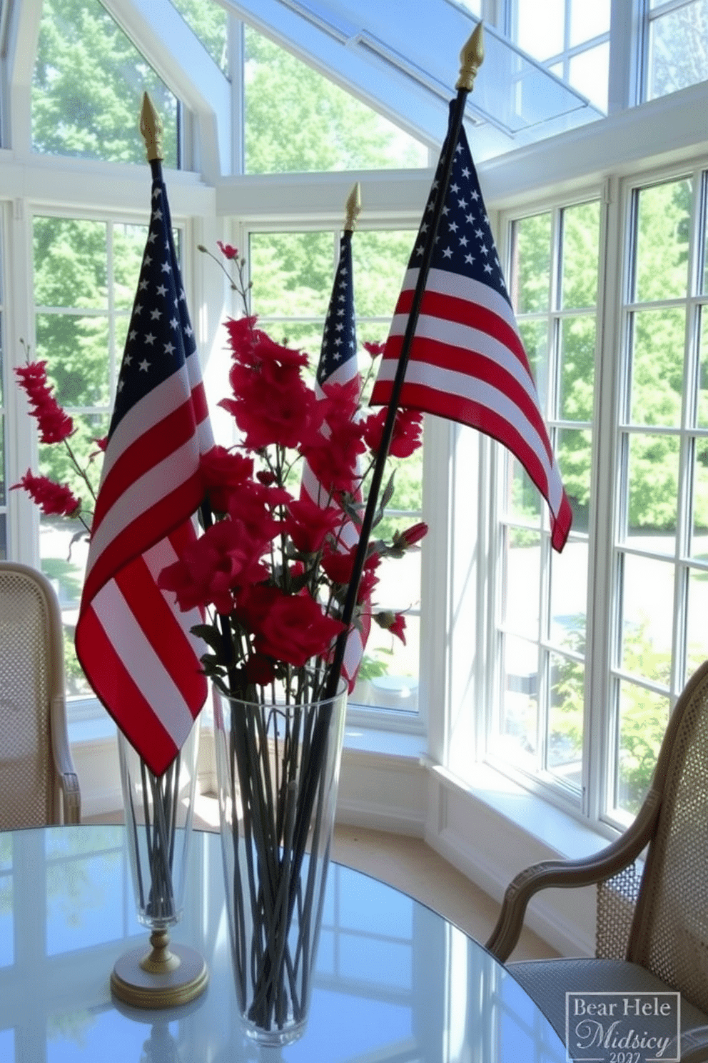 A bright sunroom filled with natural light features decorative flags in tall, elegant vases. The vases are placed strategically around the room, adding a festive touch to the Independence Day celebration.