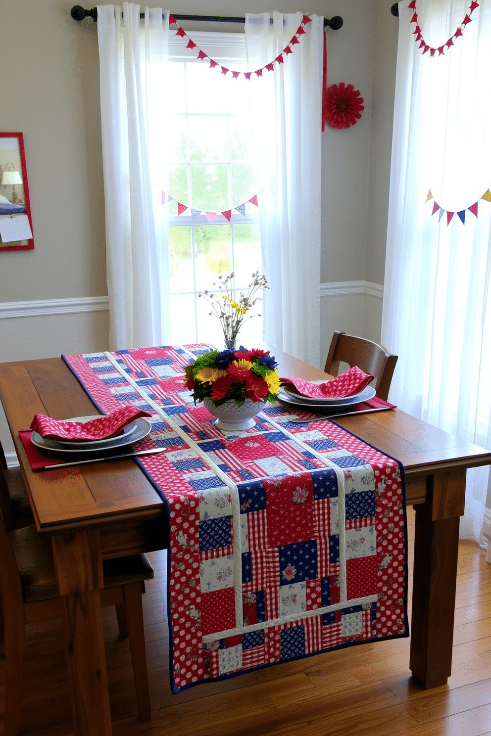 A patriotic quilted table runner is elegantly draped across a rustic wooden dining table. The runner features vibrant red, white, and blue patterns, complemented by coordinating place settings and a centerpiece of fresh flowers in seasonal colors. For window decorating ideas, sheer white curtains frame the windows, allowing natural light to filter through. Red and blue accents, such as star-shaped garlands and small flags, add a festive touch to the overall decor.