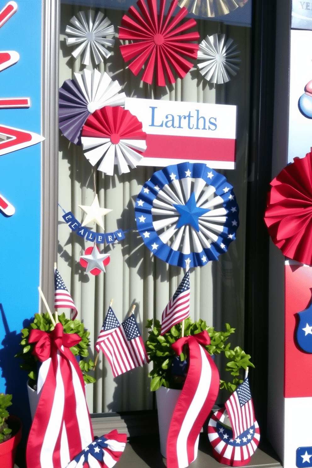 A patriotic themed wall art display features vibrant red white and blue colors in various designs celebrating Independence Day. The window decorations include hanging stars and stripes banners alongside potted plants adorned with miniature flags.