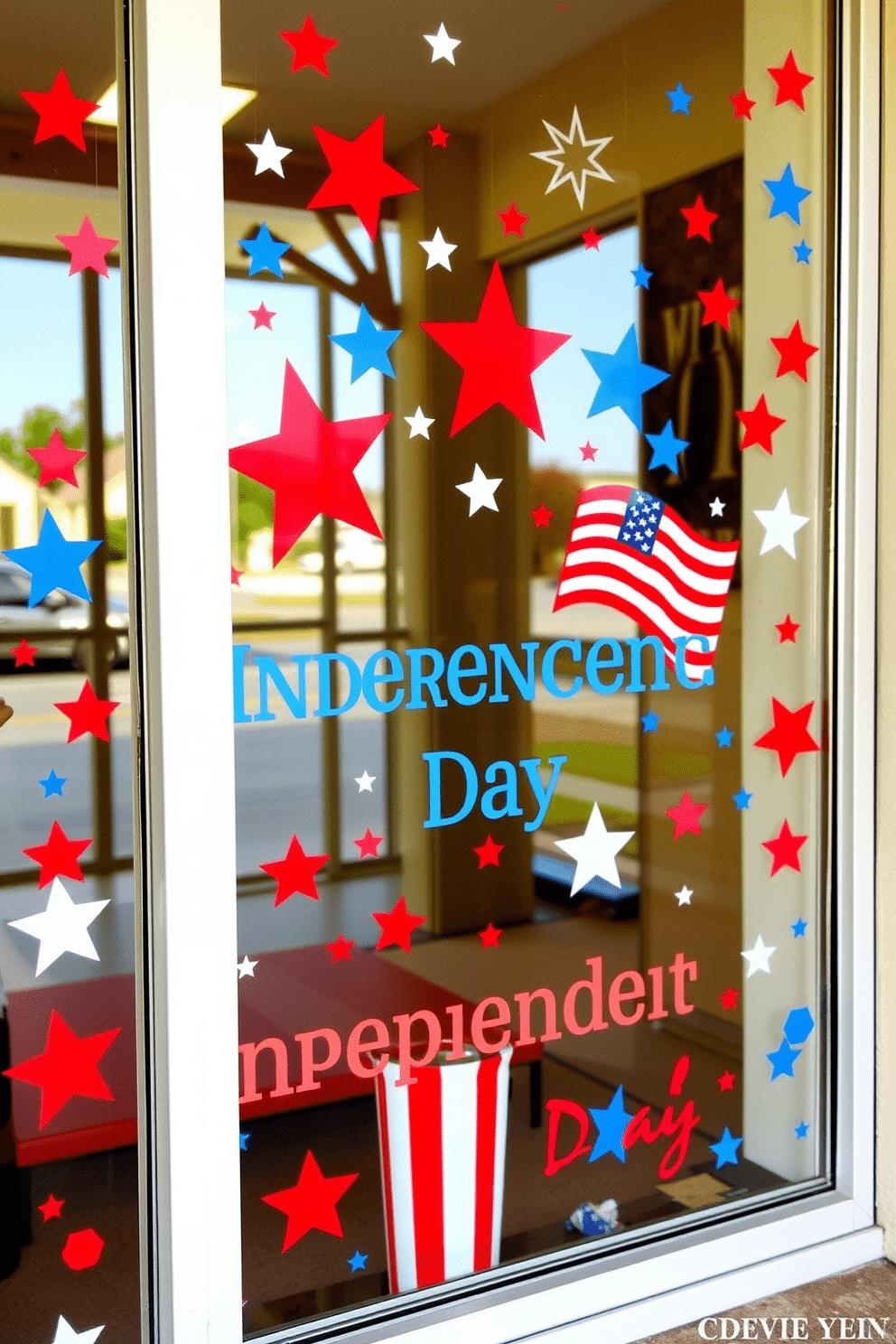 A festive window display celebrating Independence Day features vibrant red white and blue window clings. The clings showcase stars and stripes along with patriotic symbols creating a cheerful and inviting atmosphere.