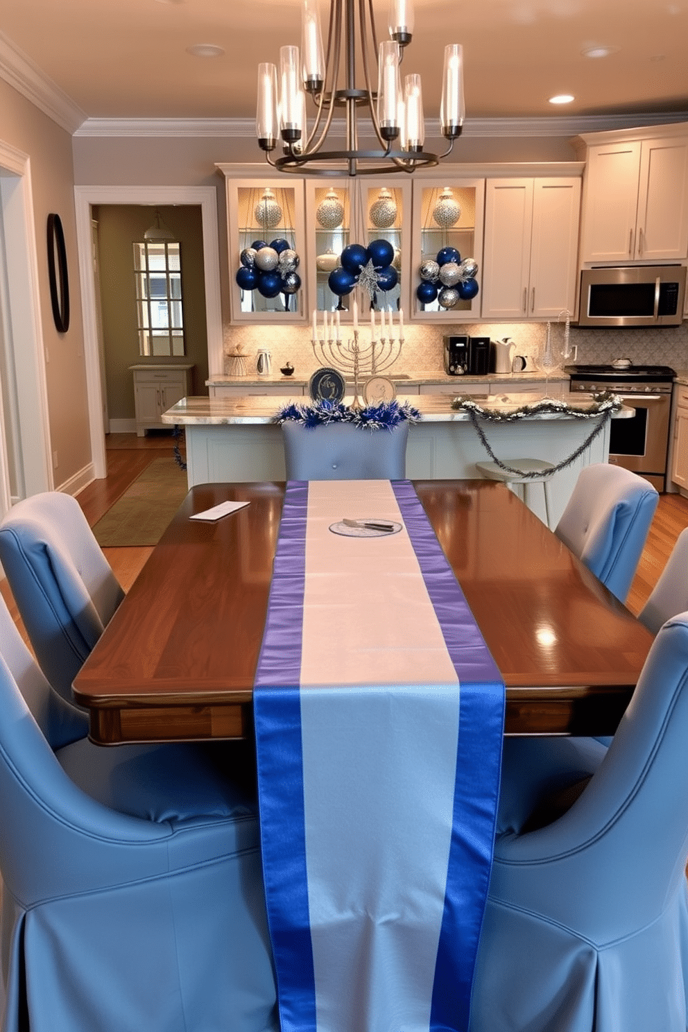 A luxurious dining area featuring a blue and silver table runner elegantly draped across a polished wooden table. Surrounding the table are plush upholstered chairs in a complementary shade, with soft lighting from a modern chandelier overhead. A festive kitchen adorned with Hanukkah decorations, showcasing a beautifully arranged menorah on the countertop. The space is enhanced with blue and silver ornaments hanging from the cabinets, creating a warm and inviting atmosphere for the holiday celebration.