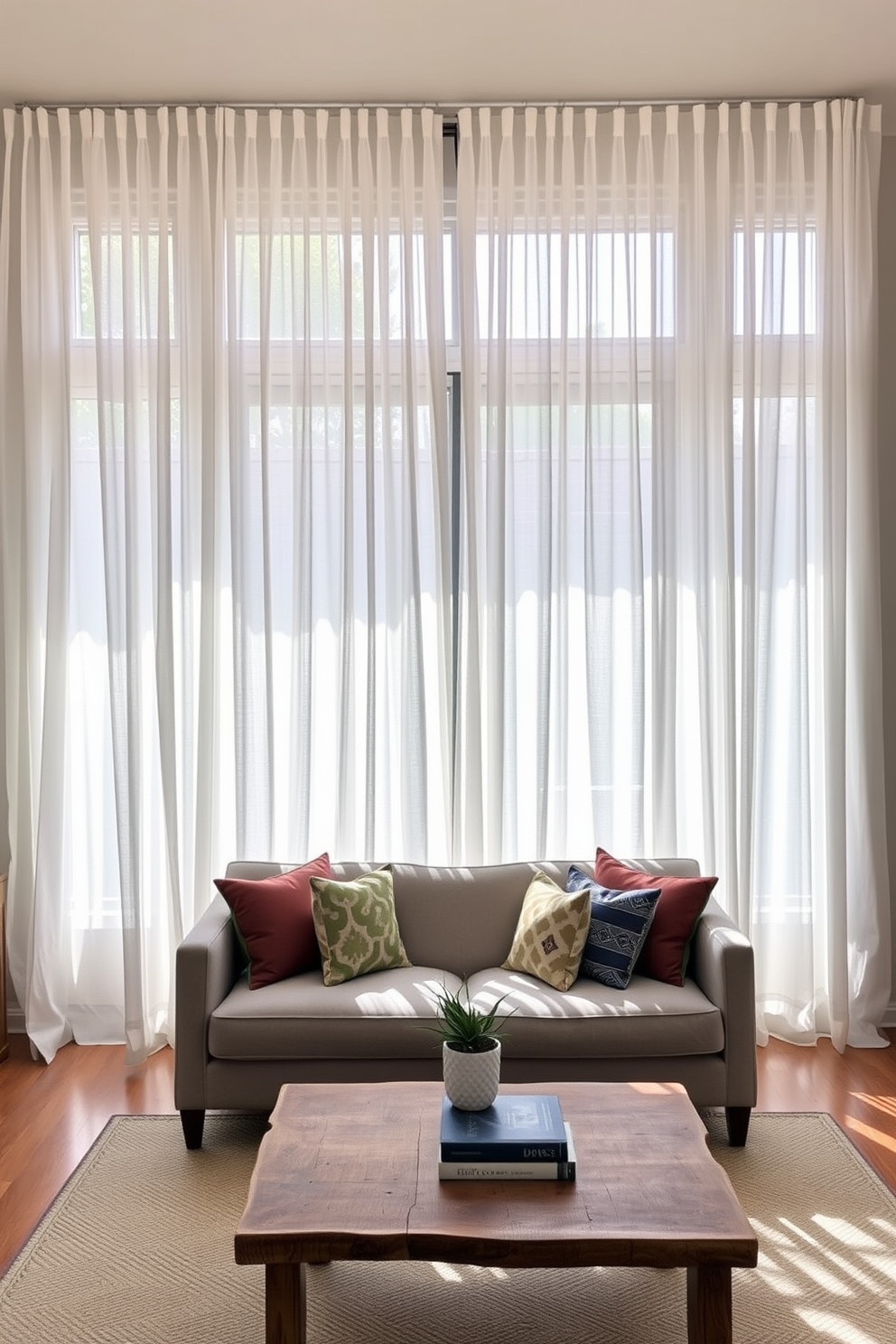 A cozy living room with lightweight drapes that flutter gently in the breeze. The drapes are a soft white fabric, allowing natural light to filter through and create an airy atmosphere. A stylish sofa in a light gray hue is paired with a set of colorful throw pillows. A coffee table made of reclaimed wood sits in the center, adorned with a stack of design books and a small potted plant.