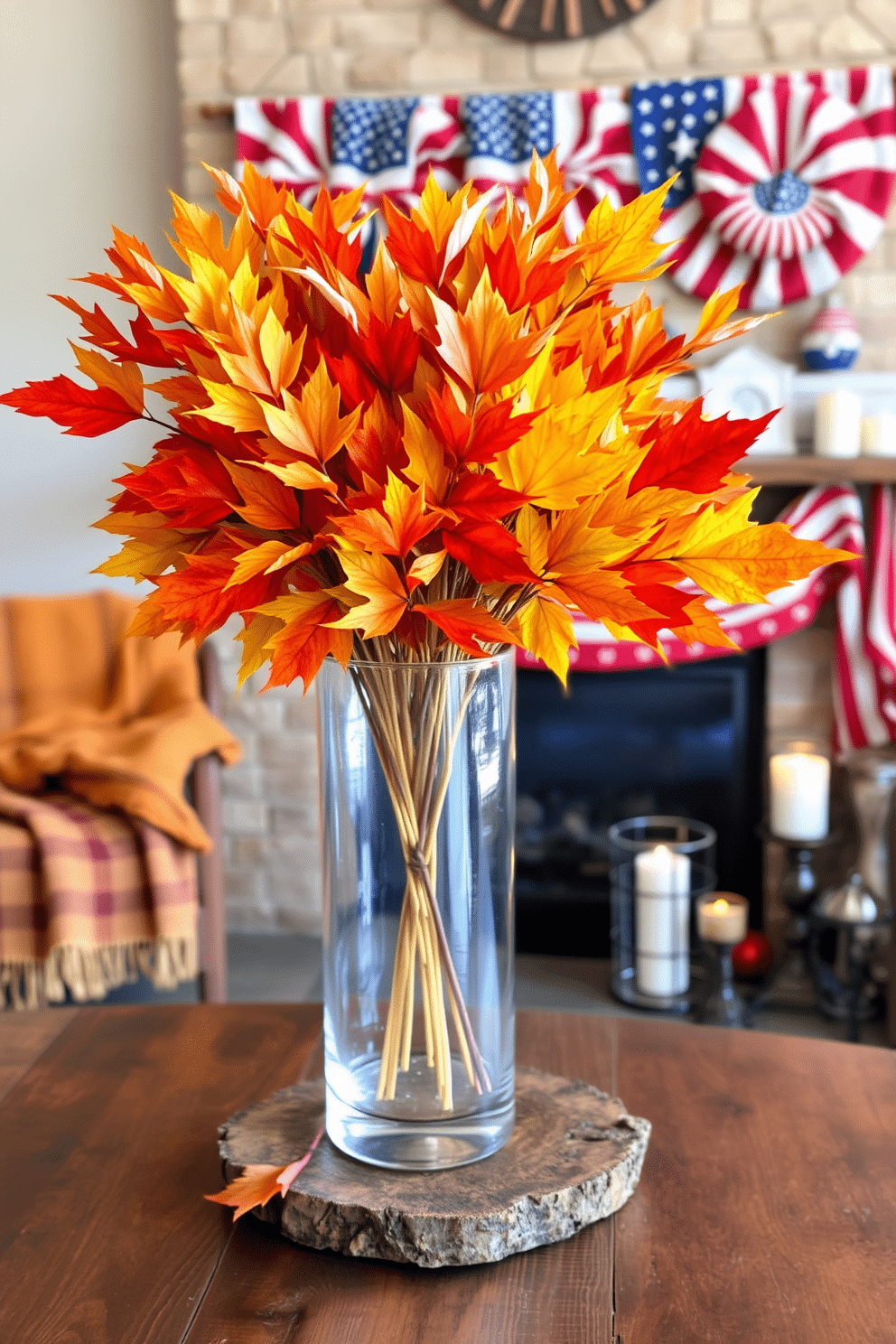 A glass vase filled with vibrant autumn leaves sits on a rustic wooden table. The warm colors of the leaves contrast beautifully with the clear glass, creating a stunning centerpiece for the season. The fireplace is adorned with festive Labor Day decorations, featuring red, white, and blue accents. Cozy blankets and seasonal candles are arranged to enhance the inviting atmosphere of the living space.