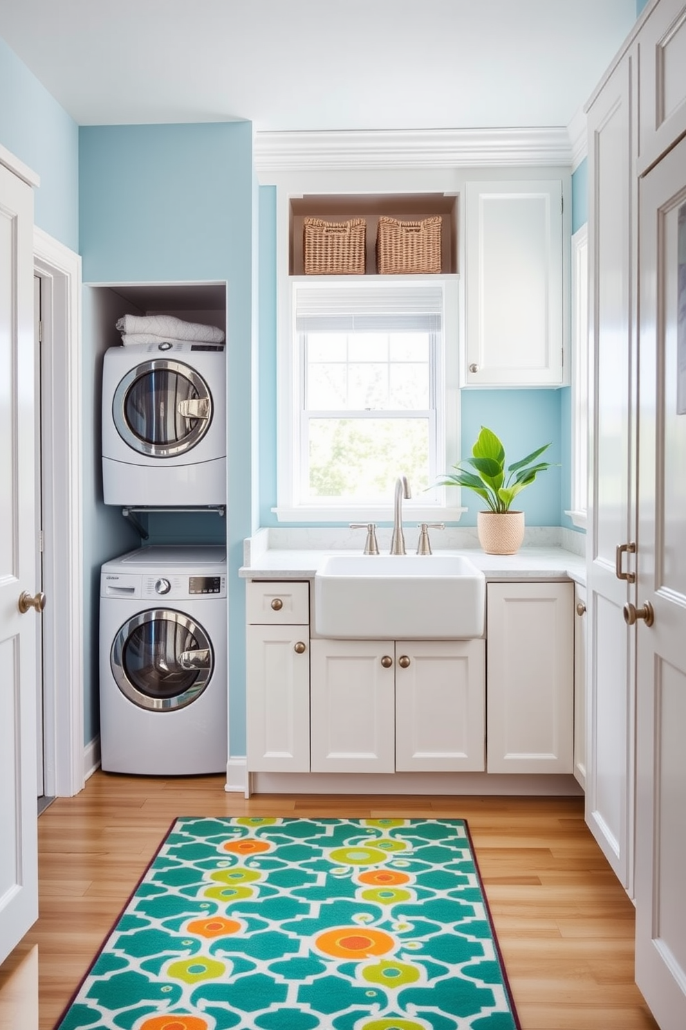 A bright and cheerful laundry room filled with natural light. The walls are painted a soft blue, and the cabinetry is white with brushed nickel hardware. In the center of the room, there's a large farmhouse sink with a stylish faucet. A fun patterned area rug in vibrant colors adds a playful touch to the space. To the left, a set of stacked washer and dryer units is neatly tucked away in a custom-built alcove. Above the machines, open shelving displays neatly folded towels and decorative storage baskets. A small potted plant sits on the countertop, bringing a touch of greenery into the room. The overall design combines functionality with a welcoming and lively atmosphere.