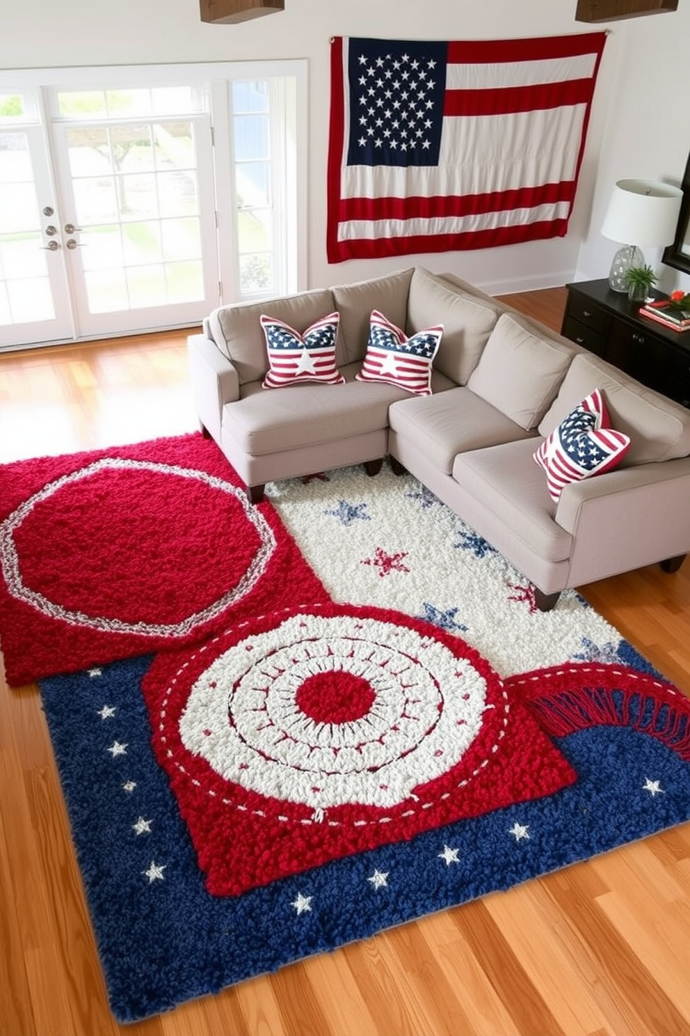 A cozy living room adorned with layered rugs featuring red white and blue hues. The rugs are artfully placed over a warm wooden floor creating a welcoming atmosphere for Labor Day celebrations. A stylish sectional sofa in a neutral tone complements the vibrant rugs. Decorative pillows with stars and stripes add a festive touch to the seating arrangement.