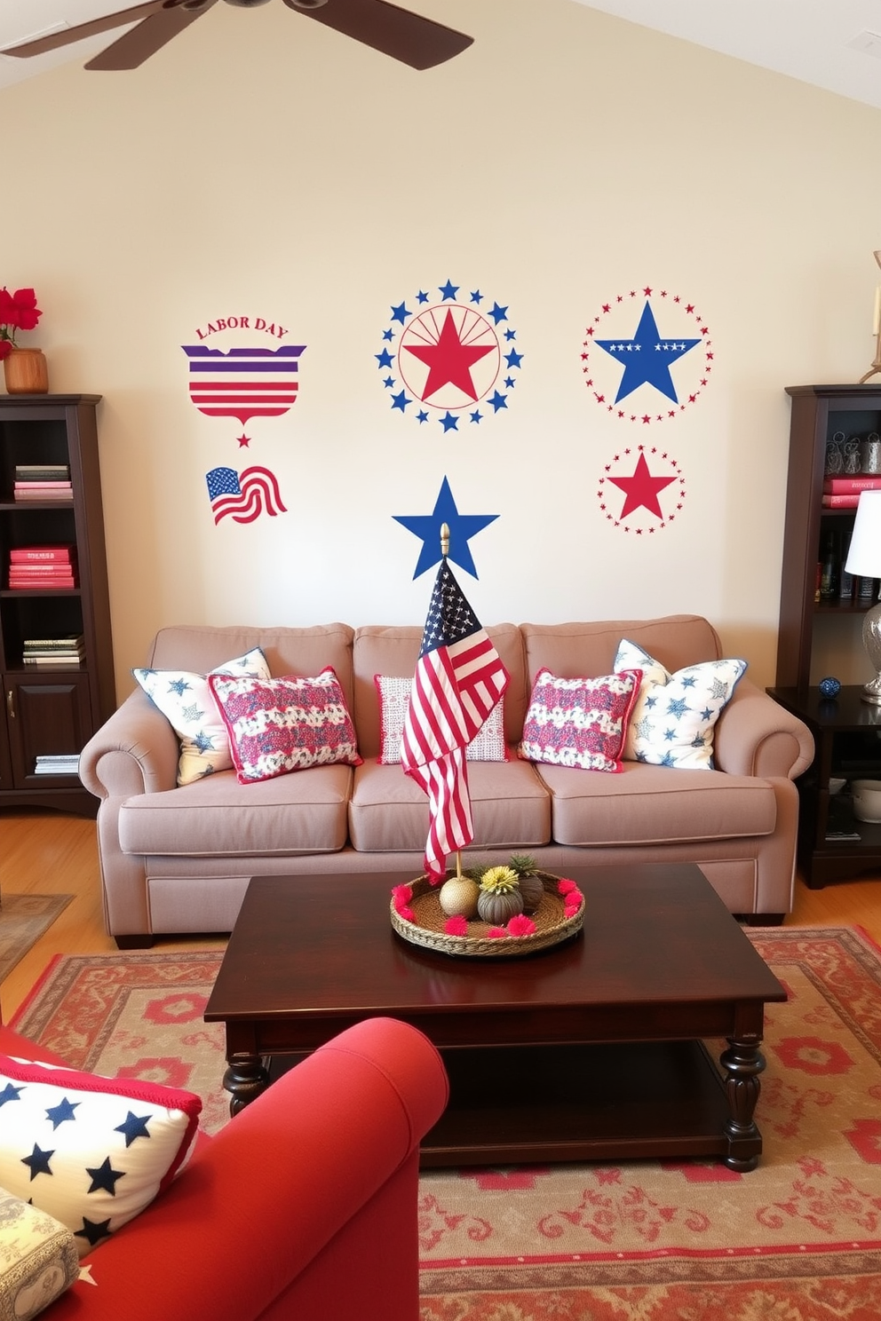 A cozy living room adorned with wall decals featuring patriotic symbols. The decals are strategically placed above a comfortable sofa, creating an inviting atmosphere for gatherings. The room is decorated with red, white, and blue accents, including throw pillows and a festive rug. A coffee table in the center holds a small flag and seasonal decor, enhancing the Labor Day theme.