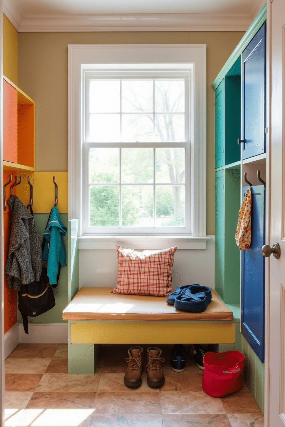 A cozy mudroom designed for children with built-in lockers for storing gear. The lockers are painted in cheerful colors and feature hooks for hanging jackets and backpacks. The floor is covered in durable, easy-to-clean tiles that can withstand muddy shoes. A bench with soft cushions sits beneath a large window, providing a comfortable spot for kids to sit and put on their shoes.