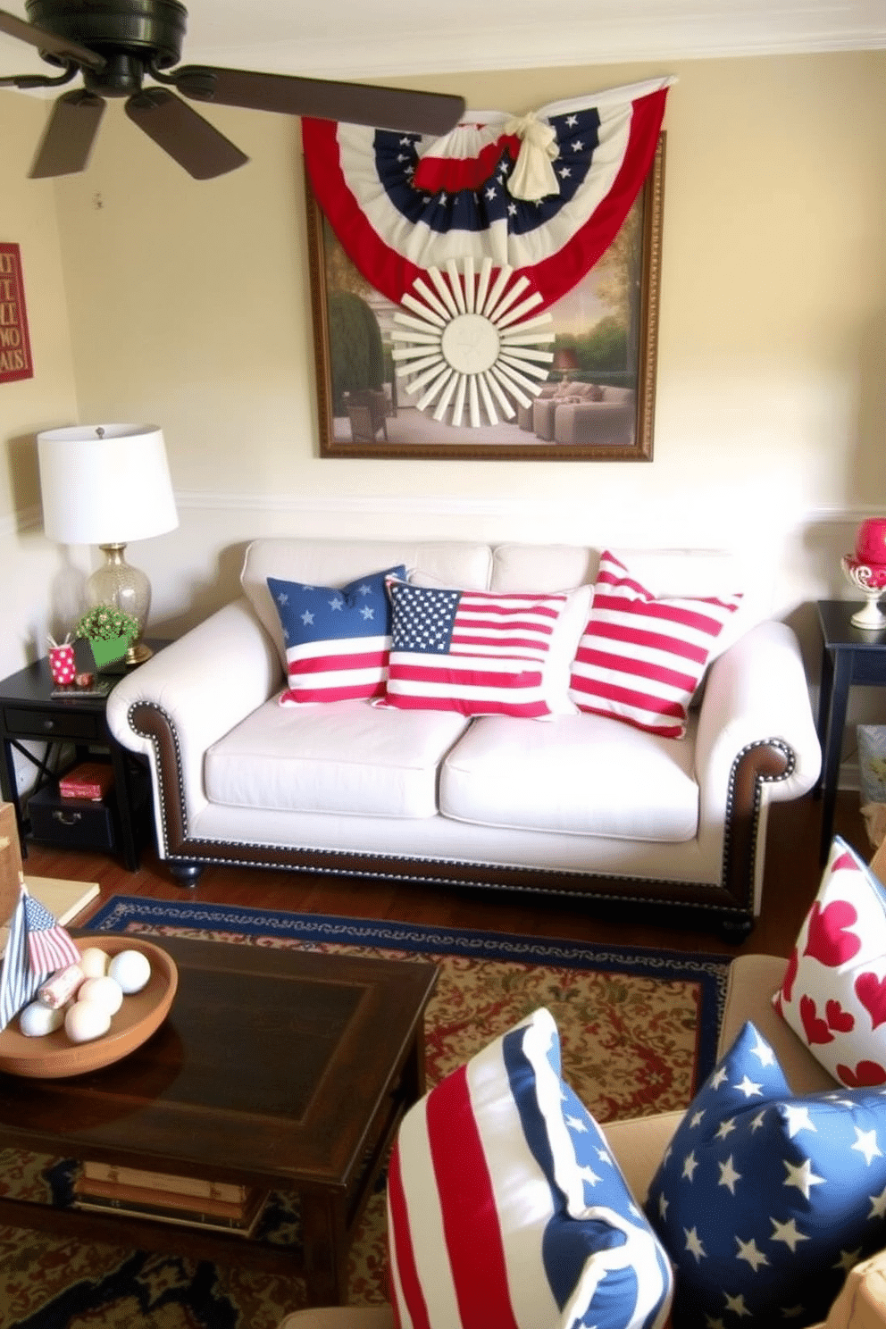 A cozy small living room decorated for Labor Day features a comfortable couch adorned with American flag pillows. The space is enhanced with festive touches like red, white, and blue accents, creating a welcoming atmosphere for gatherings.