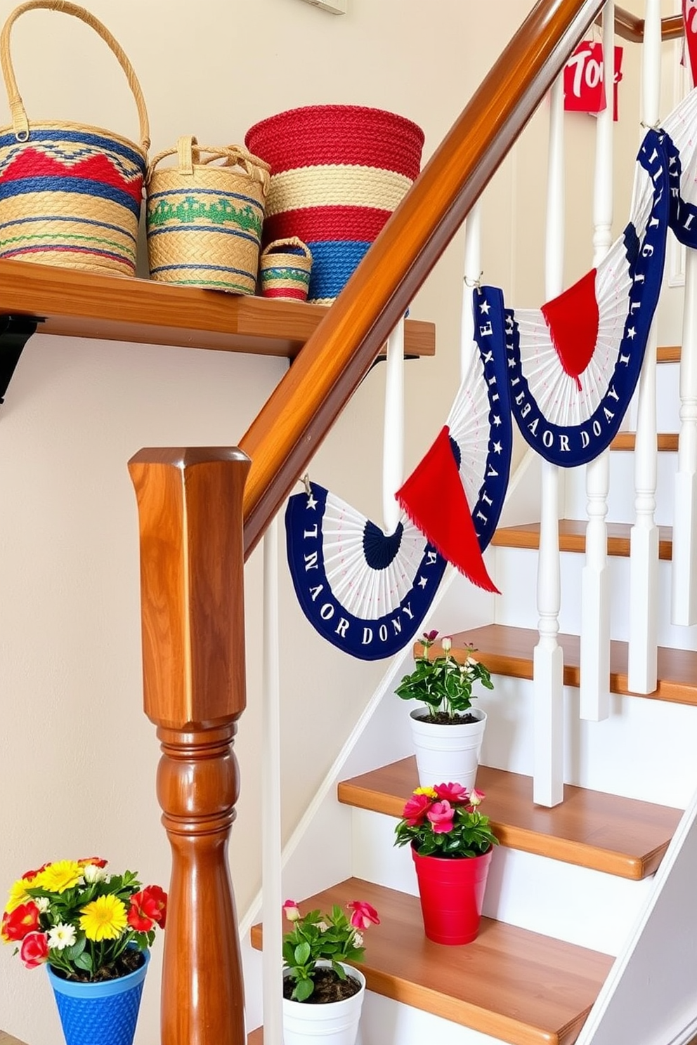 Colorful baskets in various sizes are arranged on a wooden shelf, adding a vibrant touch to the space. The baskets are woven with natural fibers and feature bright patterns, enhancing the overall decor while providing practical storage solutions. The staircase is adorned with festive Labor Day decorations, including red, white, and blue banners draped along the railing. Small potted plants with seasonal blooms are placed on each step, creating a welcoming and cheerful atmosphere.