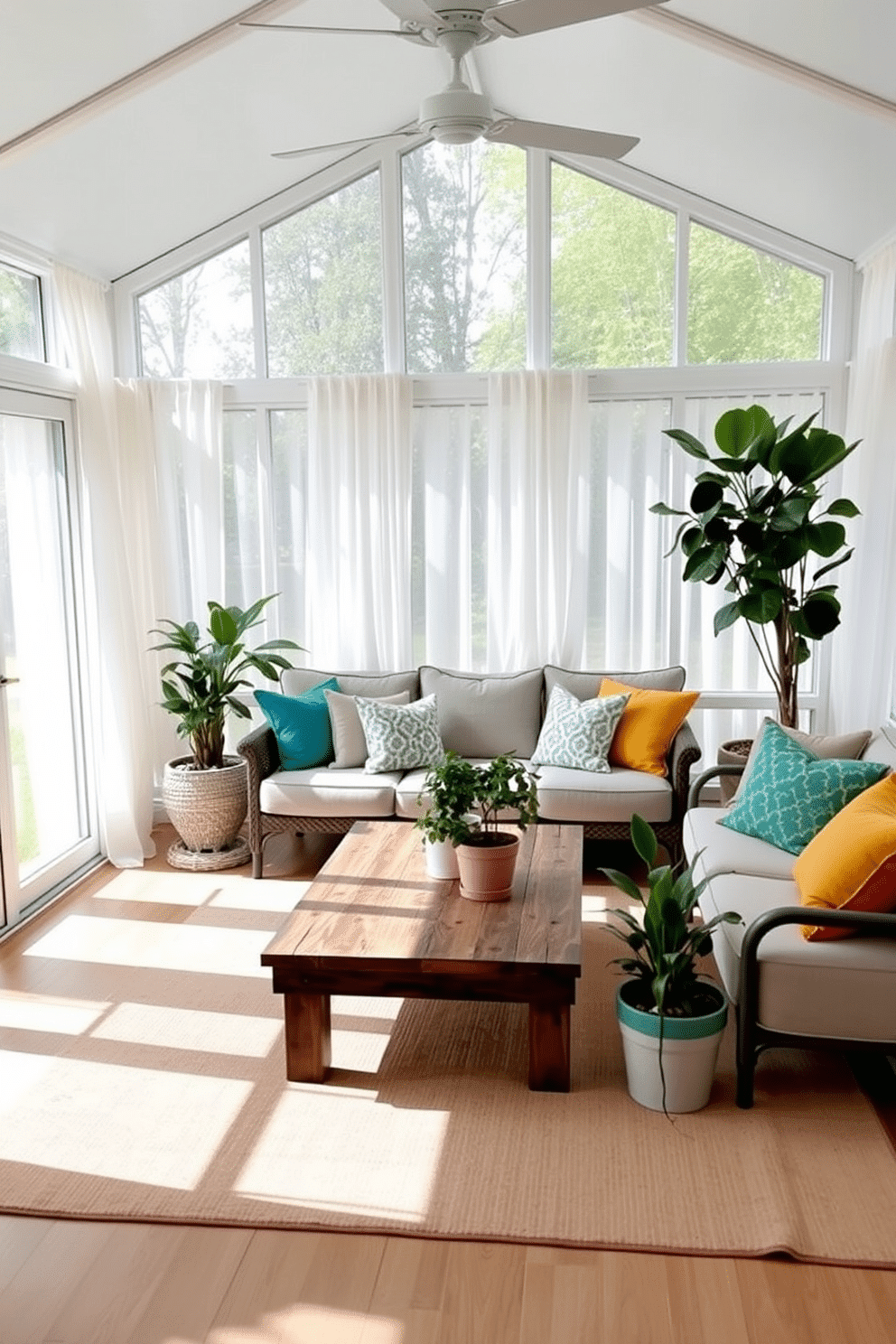 A sunroom filled with natural light features large windows adorned with sheer white curtains. The space is enhanced by a cozy seating arrangement with a light gray sofa, accented by vibrant throw pillows in shades of teal, yellow, and coral. A rustic wooden coffee table sits in the center, surrounded by potted plants that bring a touch of greenery. The floor is covered with a soft, neutral area rug, creating a warm and inviting atmosphere for relaxation and gatherings.