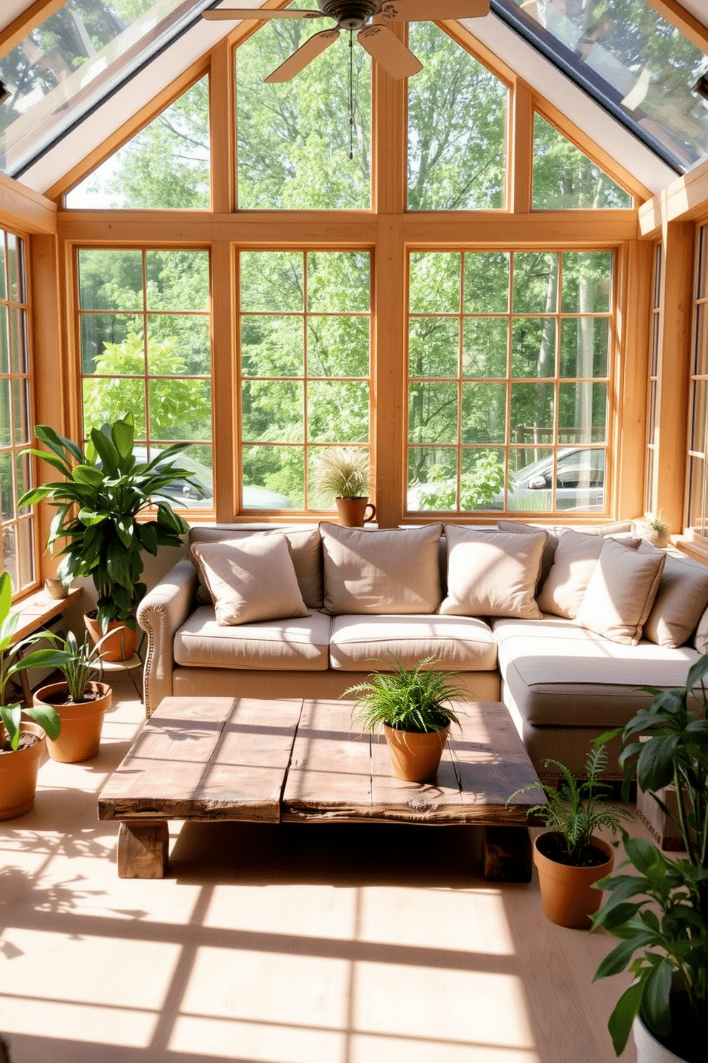 A cozy sunroom filled with natural light. The space features large windows framed with light wooden accents, allowing the sunshine to illuminate the room. In the center, a comfortable sectional sofa is adorned with soft, earthy-toned cushions. A rustic wooden coffee table sits in front, surrounded by potted plants that bring a touch of nature indoors.