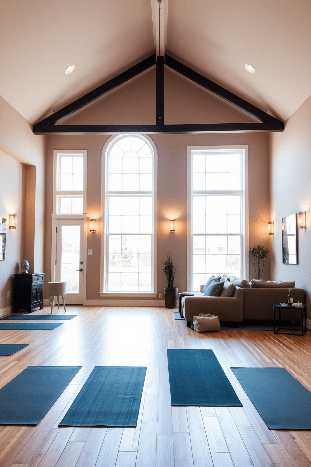 A relaxing yoga studio with calming decor features soft, neutral colors on the walls, creating a serene atmosphere. Large windows allow natural light to flood in, illuminating the space where yoga mats are neatly arranged on a bamboo floor. The large basement design incorporates cozy seating areas with plush sofas and a warm color palette. Ambient lighting fixtures create a welcoming glow, while a small kitchenette adds functionality for entertaining guests.