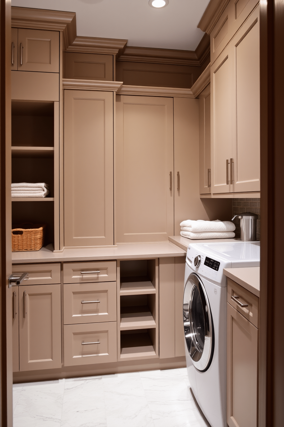 A spacious laundry room featuring custom cabinetry that offers ample storage solutions. The cabinetry is designed with a sleek, modern finish and includes built-in shelves, drawers, and a dedicated folding area.