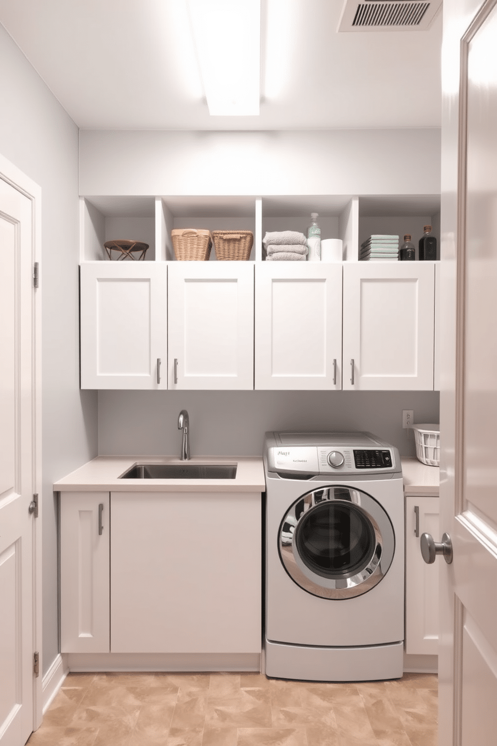 A functional laundry room featuring under-sink cabinets that provide ample hidden storage. The cabinets are sleek and modern, finished in a soft white, complementing the light gray walls and the durable, water-resistant flooring. Incorporating open shelving above the cabinets allows for easy access to frequently used items while maintaining a tidy appearance. The space is illuminated by bright LED lighting, enhancing the clean and organized feel of the laundry room.