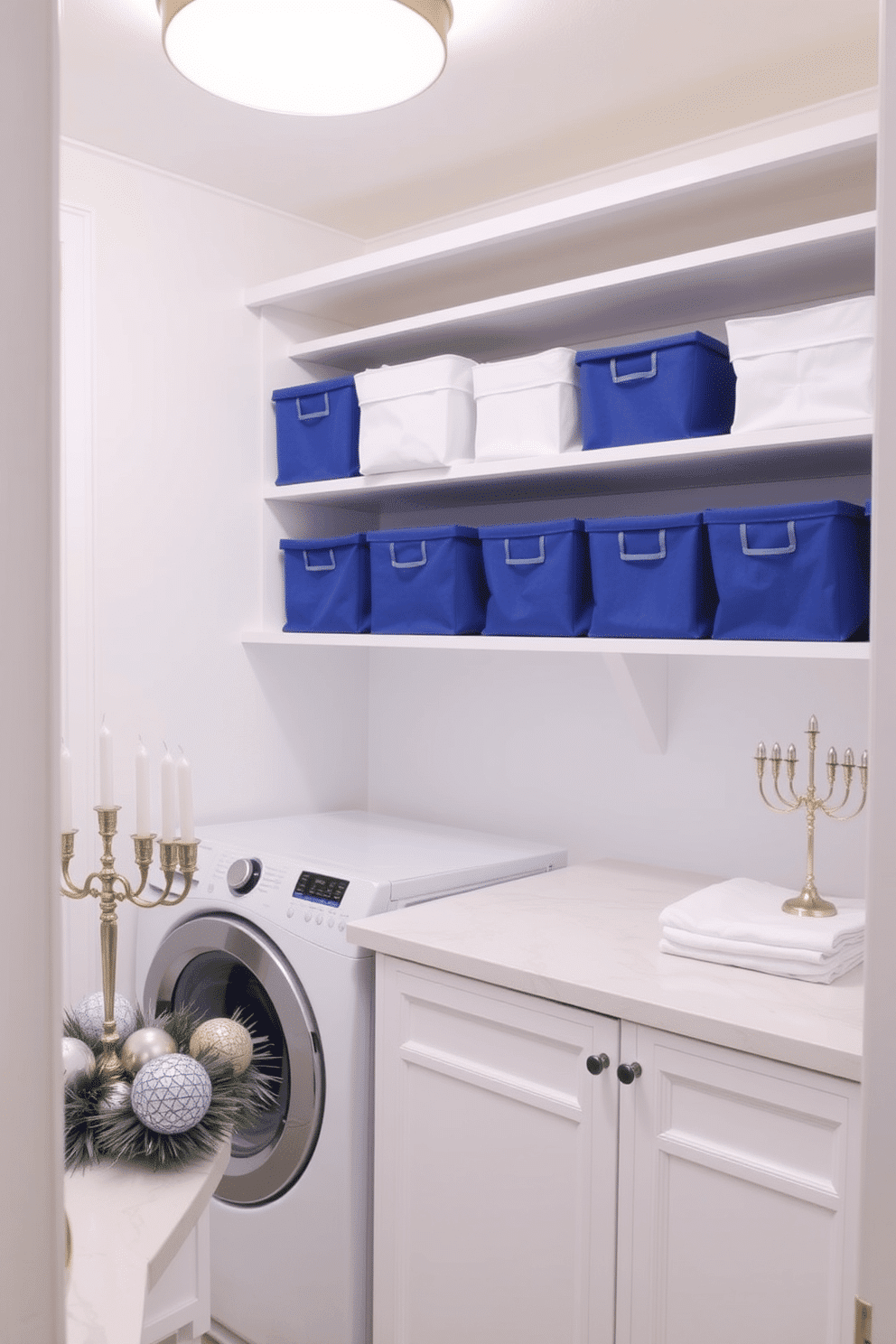 A bright and airy laundry room features blue and white fabric bins neatly arranged on open shelves. The walls are painted a soft white, and a stylish countertop provides ample space for folding clothes, adorned with seasonal Hanukkah decorations like menorahs and blue and silver ornaments.