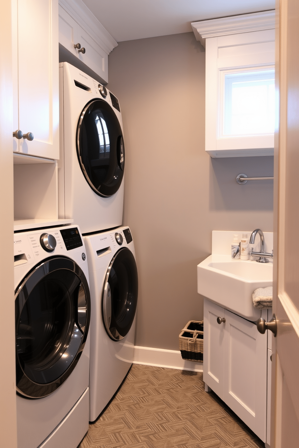 A modern laundry room featuring a stacked washer and dryer, seamlessly integrated into a sleek cabinetry system. To the side, a dedicated pet washing station with a raised tub, complete with a handheld showerhead and storage for grooming supplies, enhances functionality. The walls are painted in a soft gray hue, complemented by white cabinetry and a durable, patterned vinyl floor. A small window above the pet washing station allows natural light to brighten the space, while decorative baskets provide stylish organization for laundry essentials.