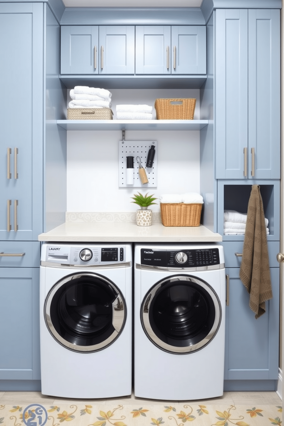 A functional laundry room featuring organized storage solutions in sleek cabinetry. The cabinets are painted in a soft blue hue, providing a calming backdrop, while open shelves above display neatly folded towels and decorative baskets. The top-loading washer is seamlessly integrated into the cabinetry, with a countertop above for folding clothes. A stylish pegboard on the wall holds laundry essentials, and a small potted plant adds a touch of greenery to the space.