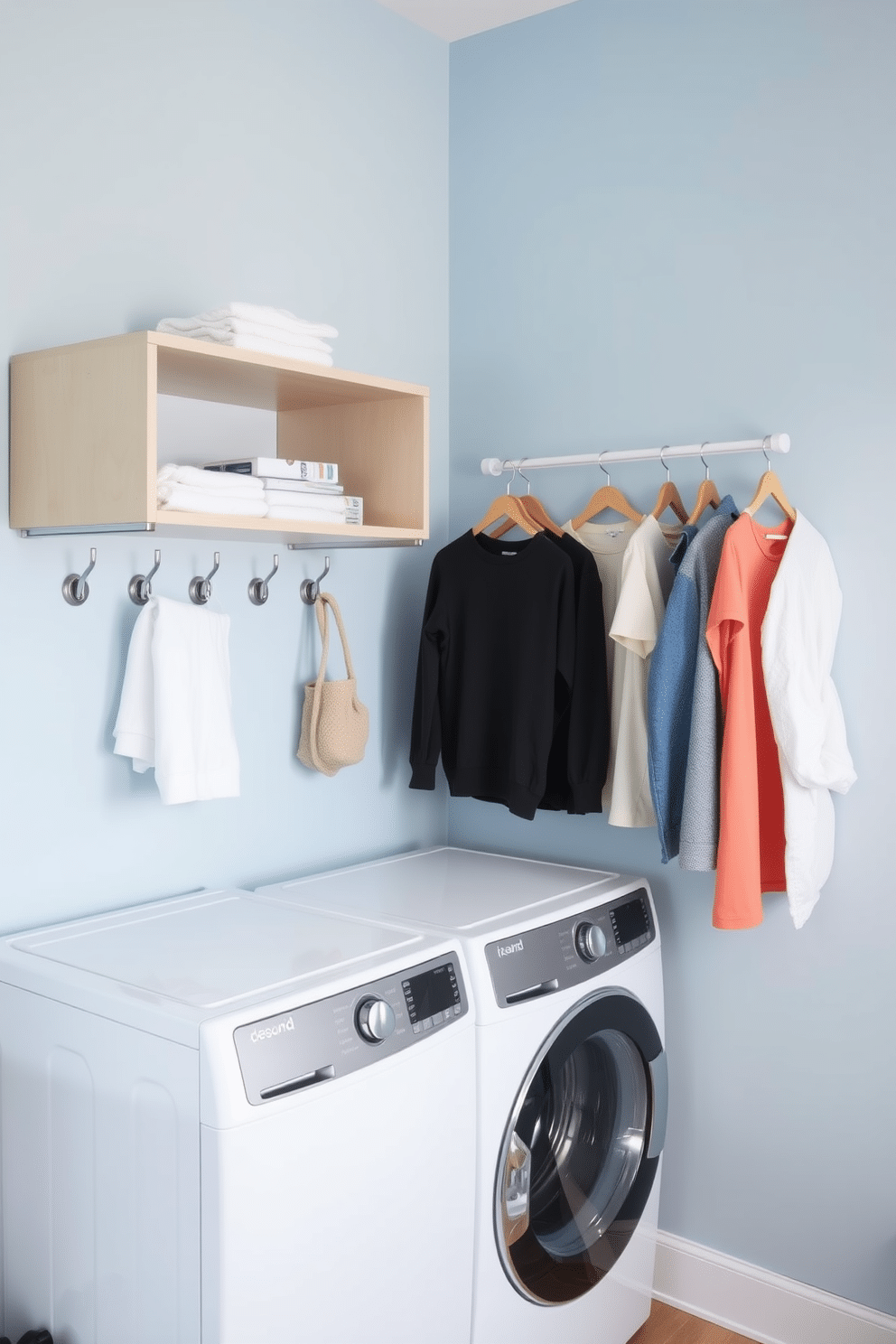 A modern laundry room that creatively utilizes wall space for drying clothes. Above a top-loading washer, there are sleek, open shelves holding neatly folded towels and laundry supplies, while a series of hooks line the wall for hanging garments. The walls are painted in a soft blue hue, creating a calming atmosphere. A stylish drying rack is mounted on the wall, easily foldable when not in use, complementing the overall functionality of the space.