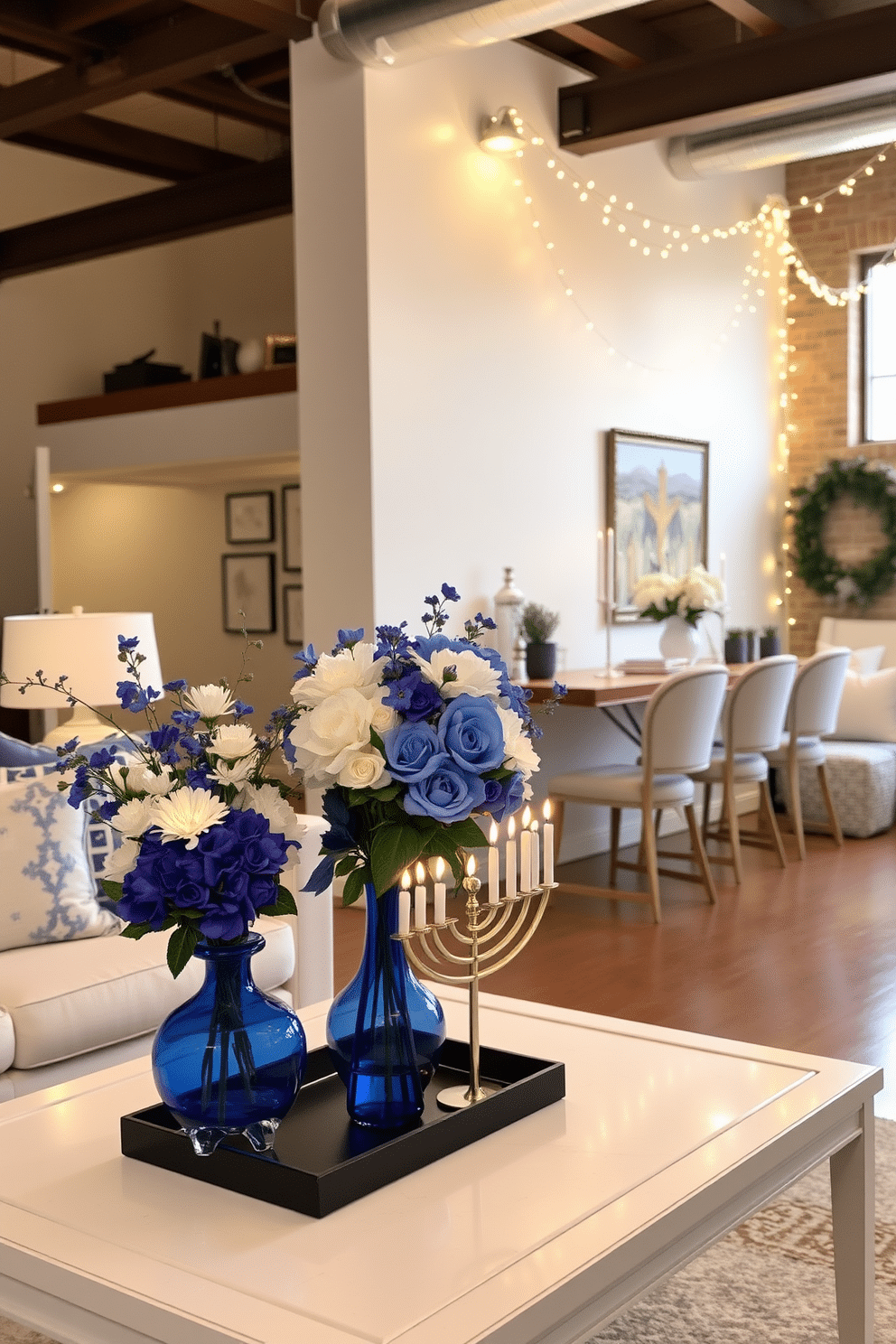 A charming living space adorned with blue and white floral arrangements. The vibrant flowers are artfully arranged in elegant vases, enhancing the room's fresh and inviting atmosphere. A cozy loft decorated for Hanukkah, featuring a beautifully lit menorah on the coffee table. Soft blue and silver accents complement the warm glow of string lights draped across the exposed beams.