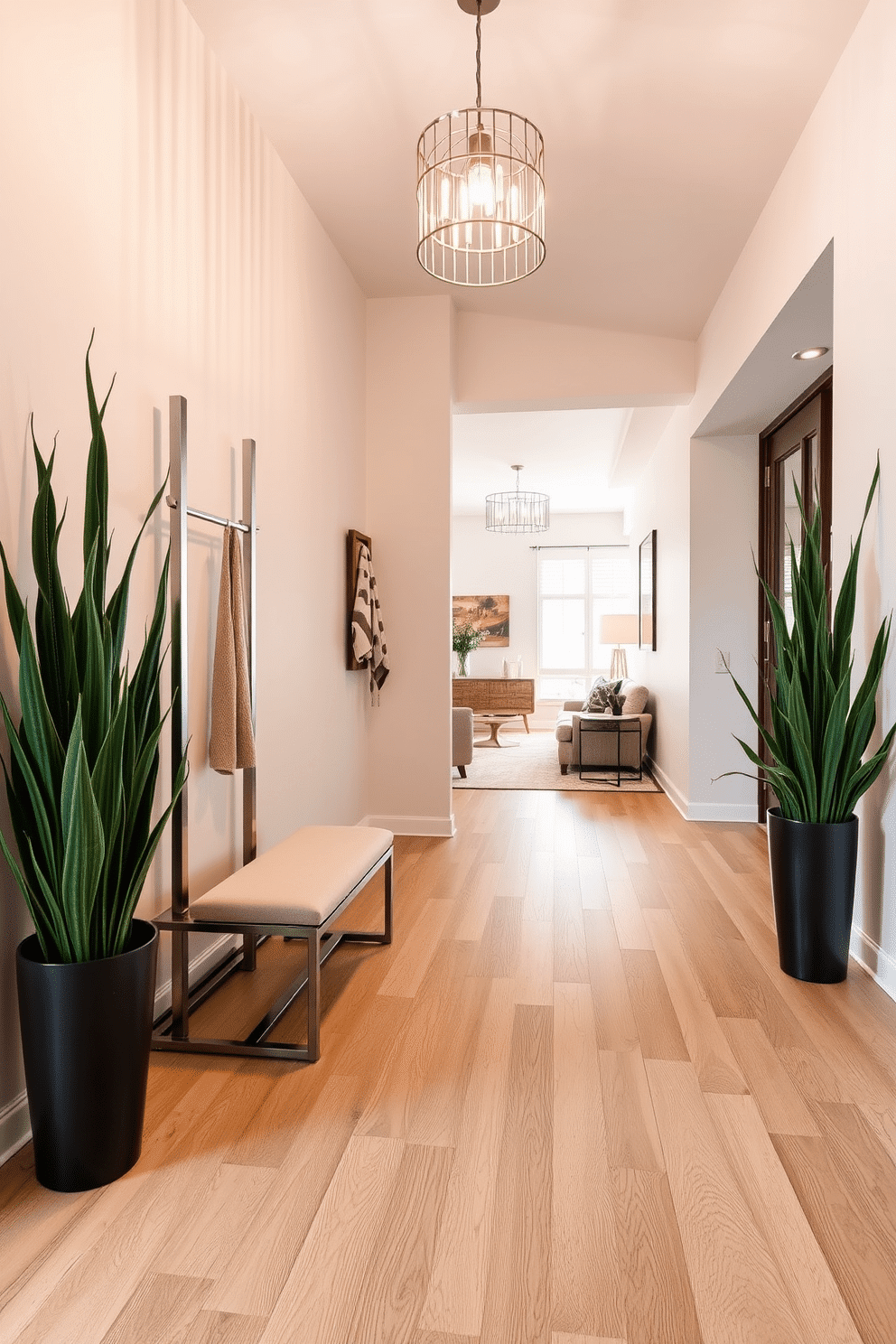 A sleek coat rack stands against the wall, crafted from brushed stainless steel with minimalist design elements, providing both style and functionality. Beneath it, a small bench with a soft cushion invites guests to sit while removing their shoes, enhancing the foyer's welcoming atmosphere. The long foyer features elegant, wide planks of light oak flooring that stretch toward the living area, creating a sense of continuity. Flanking the sides, tall potted plants add a touch of greenery, while a statement light fixture hangs from the ceiling, illuminating the space with a warm glow.