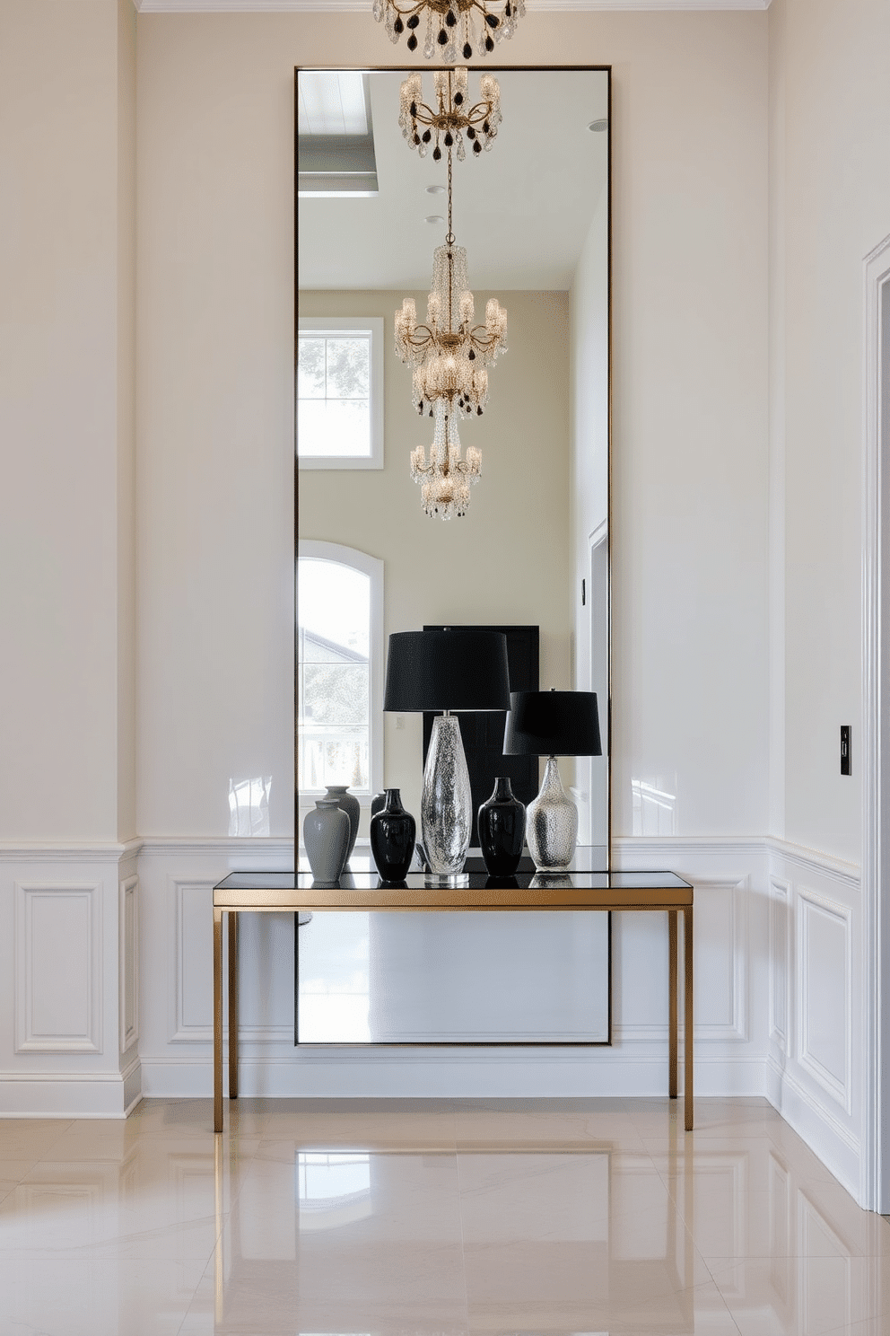 A long foyer features an oversized mirror that reflects natural light, creating an illusion of depth and space. The walls are adorned with elegant wainscoting, and a stylish console table sits beneath the mirror, accented by decorative vases and a statement lamp.