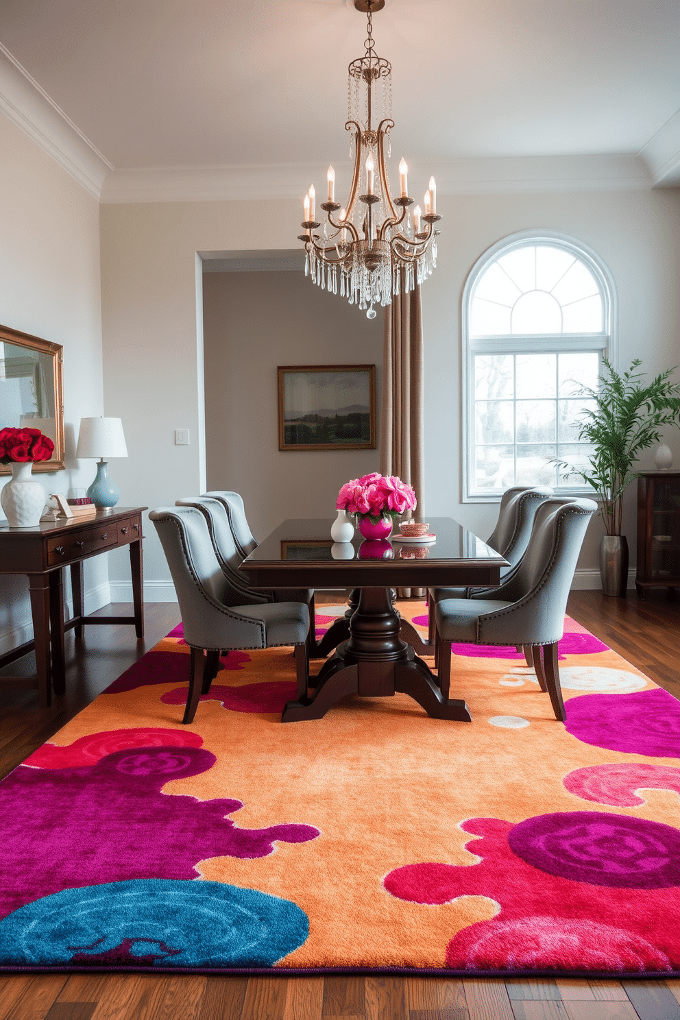 A bold area rug in vibrant colors anchors the dining space, creating a striking focal point. Surrounding the rug, an elegant wooden dining table is paired with plush upholstered chairs, enhancing comfort and style. The room features a stunning chandelier that cascades light beautifully, adding a touch of sophistication. Soft, neutral wall colors complement the rich tones of the furniture, creating a harmonious and inviting atmosphere.