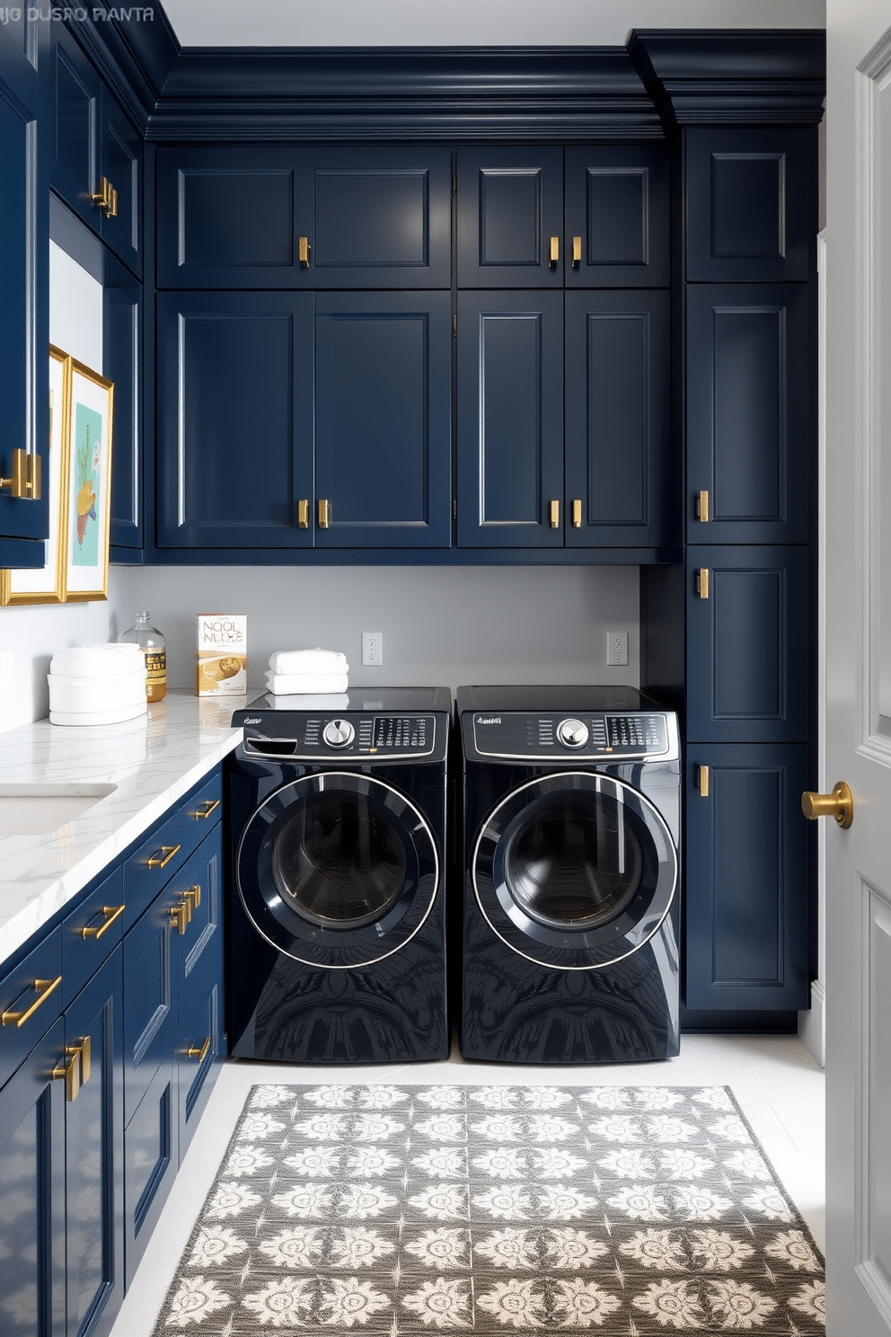 A luxury laundry room features custom cabinetry in a rich navy blue, providing ample storage for cleaning supplies and linens. The space is accented with elegant brass hardware and a stunning marble countertop that extends into a folding area. Personalized touches include framed art pieces that showcase vibrant colors and playful designs, adding character to the room. A stylish rug in a geometric pattern lies beneath a sleek washer and dryer, enhancing the overall aesthetic while providing comfort underfoot.