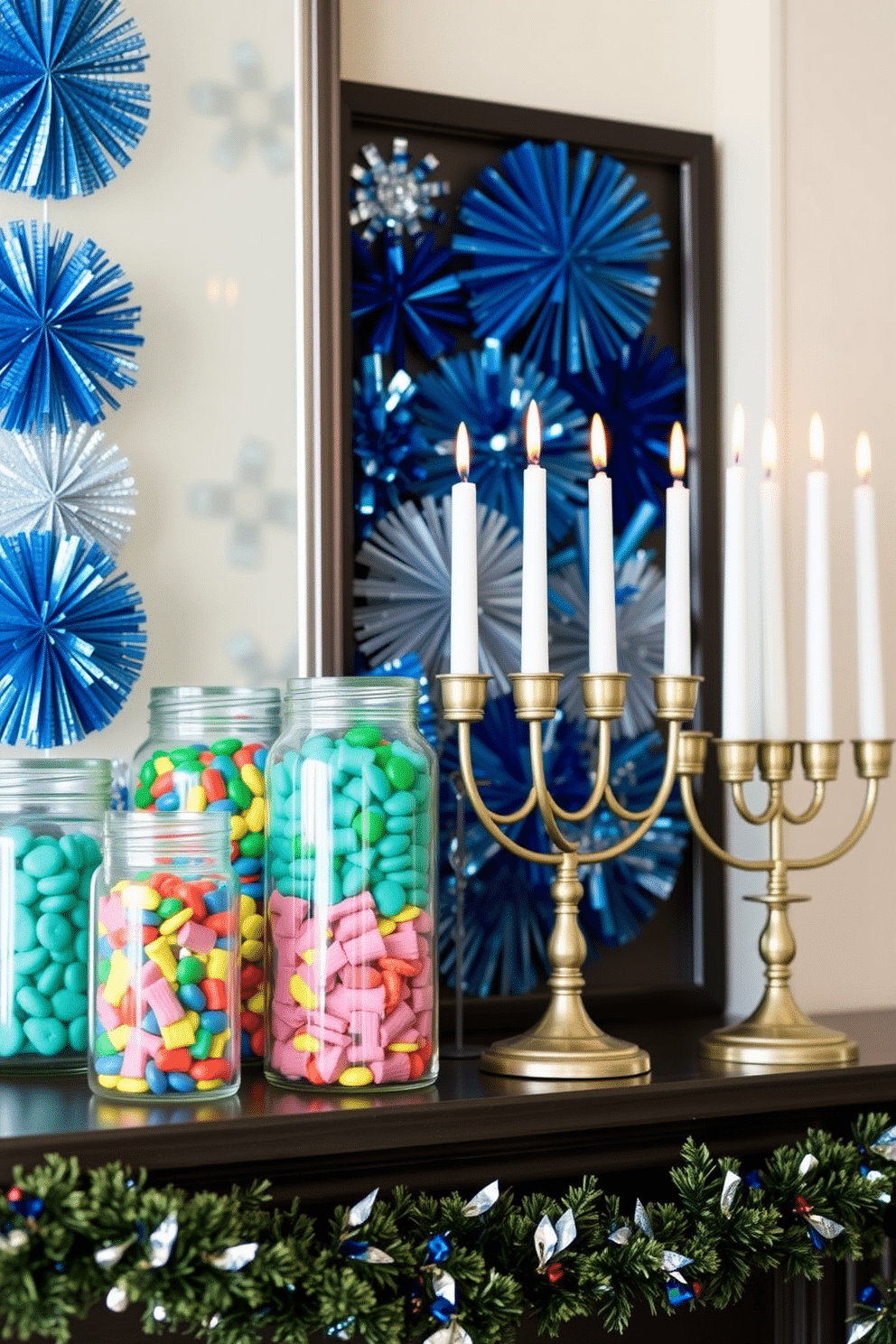 A festive mantel adorned for Hanukkah features an array of glass jars filled with colorful gelt and assorted treats, creating a vibrant display. The jars are artfully arranged alongside traditional menorah candles, with a backdrop of shimmering blue and silver decorations that evoke the spirit of the holiday.