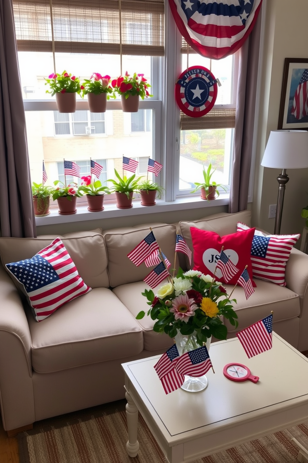 A cozy apartment living room decorated for Memorial Day. Mini flags are placed in vibrant potted plants that line the windowsill, adding a festive touch to the space. The sofa is adorned with red, white, and blue cushions, creating a patriotic atmosphere. A small coffee table features a centerpiece of flowers and additional mini flags, enhancing the holiday spirit.