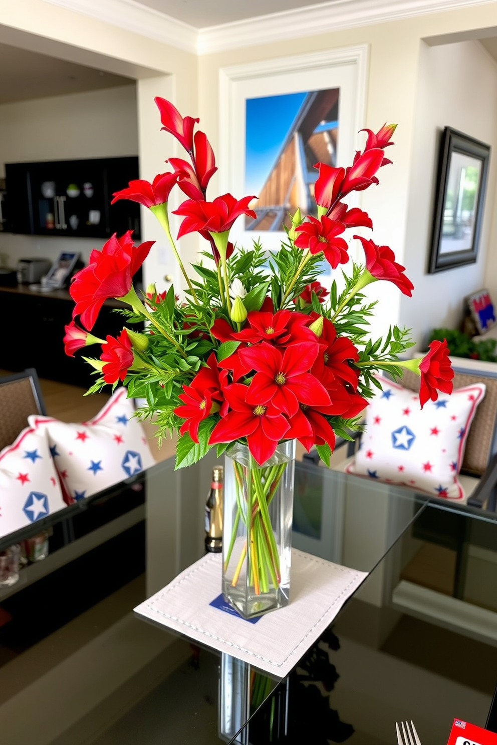 A stunning table centerpiece featuring vibrant red flowers arranged in a sleek glass vase. The flowers are complemented by lush green foliage, adding a touch of elegance to the dining experience. For Memorial Day, the apartment is adorned with patriotic decor in red, white, and blue. Cushions with star patterns and a table set with themed tableware create a festive and welcoming atmosphere.