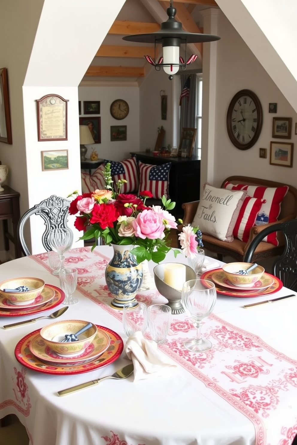 A beautifully set dining table for a festive meal. The table is adorned with elegant seasonal tableware featuring vibrant colors and intricate patterns, complemented by fresh flowers in a stylish vase. A cozy attic space transformed for Memorial Day celebrations. The decor includes patriotic accents such as red, white, and blue cushions, along with vintage memorabilia, creating a warm and inviting atmosphere.