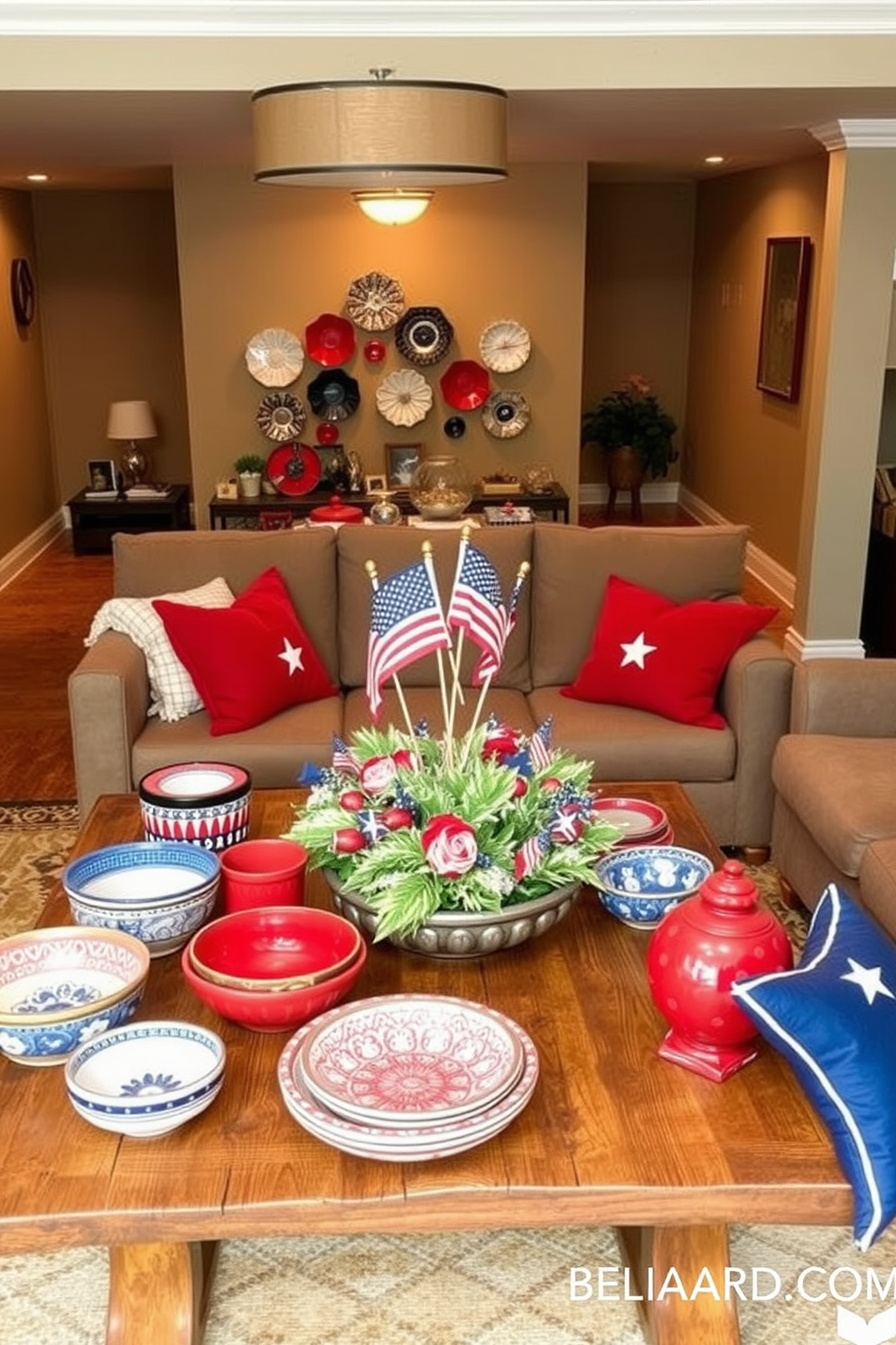 A vibrant display of ceramic dishes in red, white, and blue is arranged on a rustic wooden table. The dishes feature intricate patterns and textures, creating a festive atmosphere perfect for celebrating Memorial Day. In the basement, cozy seating is arranged around a central coffee table adorned with patriotic decorations. Soft lighting enhances the warm ambiance, while red and blue throw pillows add a touch of comfort and style.