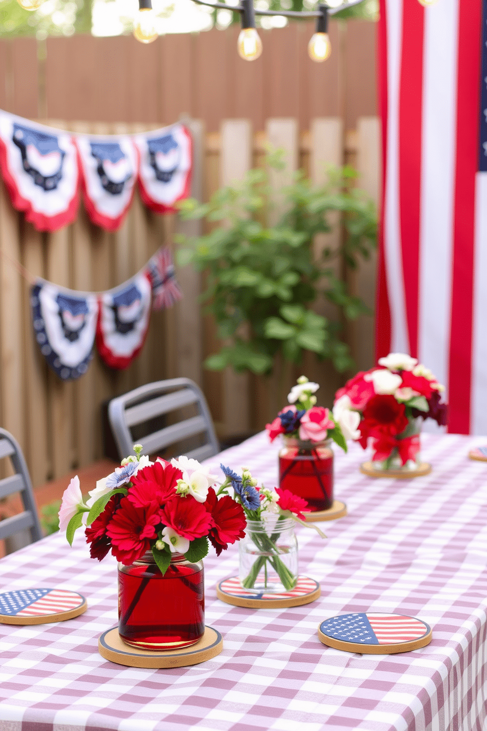 Patriotic-themed coasters for drinks. Small, round coasters featuring the American flag's stars and stripes pattern, made from durable cork material. Each coaster is bordered with a thin blue line, adding a touch of elegance, and is perfect for protecting surfaces from condensation and spills. Memorial Day Decorating Ideas. A backyard setup with red, white, and blue bunting draped along the fence, and a large American flag prominently displayed. Tables are covered with checkered tablecloths, adorned with centerpieces of fresh flowers in patriotic colors, and string lights hang overhead to create a festive atmosphere.