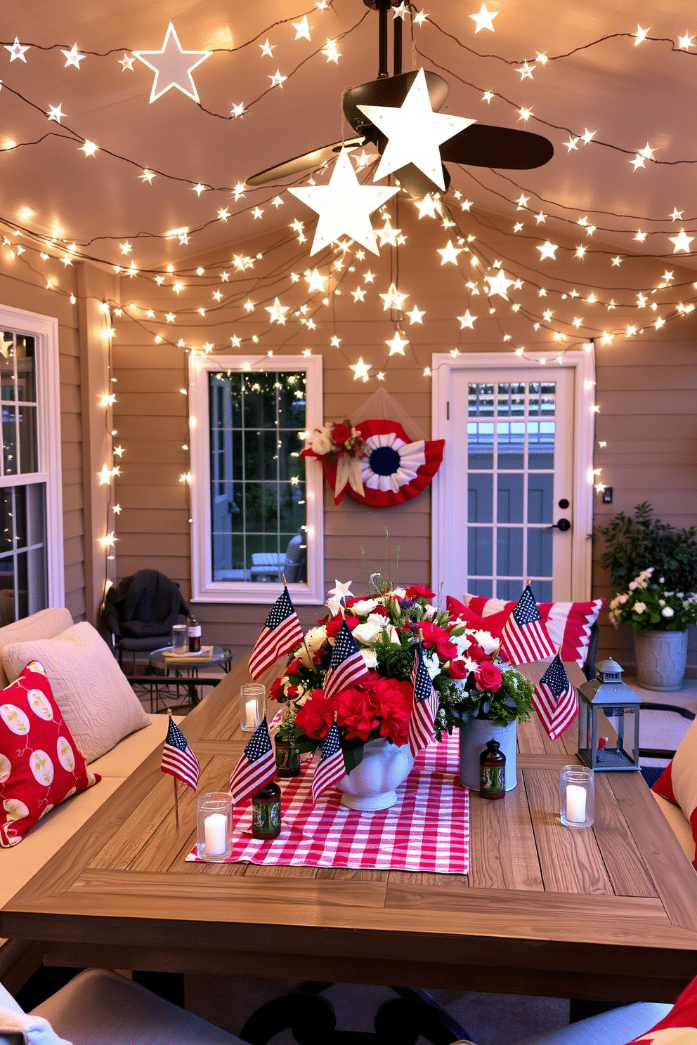 A cozy living room adorned with star-shaped fairy lights draped across the ceiling, casting a warm and magical glow. The lights are complemented by soft, neutral-colored furniture and plush throw pillows, creating a perfect ambiance for relaxation and evening gatherings. A patriotic-themed patio setup for Memorial Day, featuring red, white, and blue decorations. The space includes a large wooden table with a checkered tablecloth, surrounded by comfortable seating, and adorned with small American flags, festive lanterns, and a centerpiece of fresh flowers in patriotic colors.