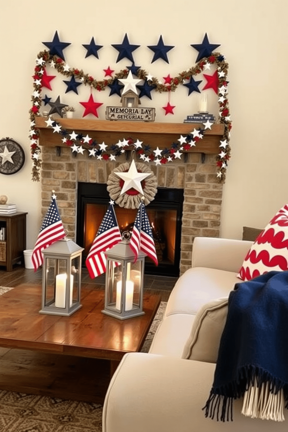 A cozy living room adorned with patriotic Memorial Day decorations. Decorative lanterns with American flags are placed on the rustic wooden coffee table, casting a warm glow. Above the fireplace, a garland of red, white, and blue stars is draped, complementing the lanterns. The walls are painted in a soft cream color, and a navy blue throw blanket is casually draped over the arm of a plush sofa.