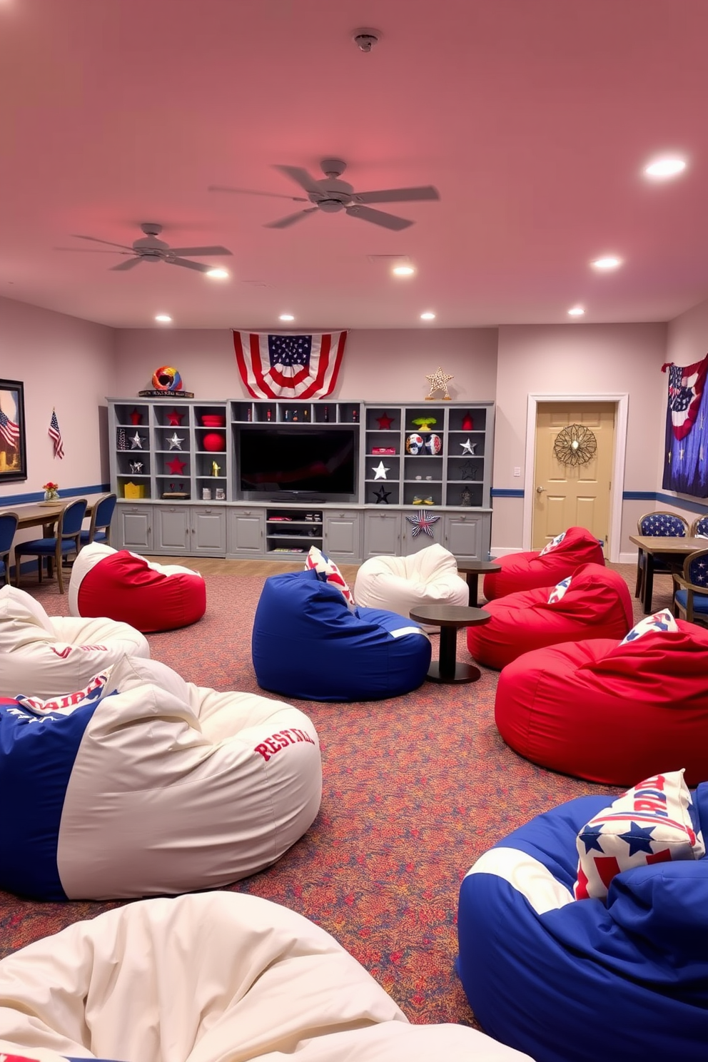 A vibrant game room filled with red white and blue bean bag chairs creates a festive atmosphere for Memorial Day celebrations. The space features a large entertainment center with a flat screen TV and patriotic-themed decor enhancing the overall festive vibe.