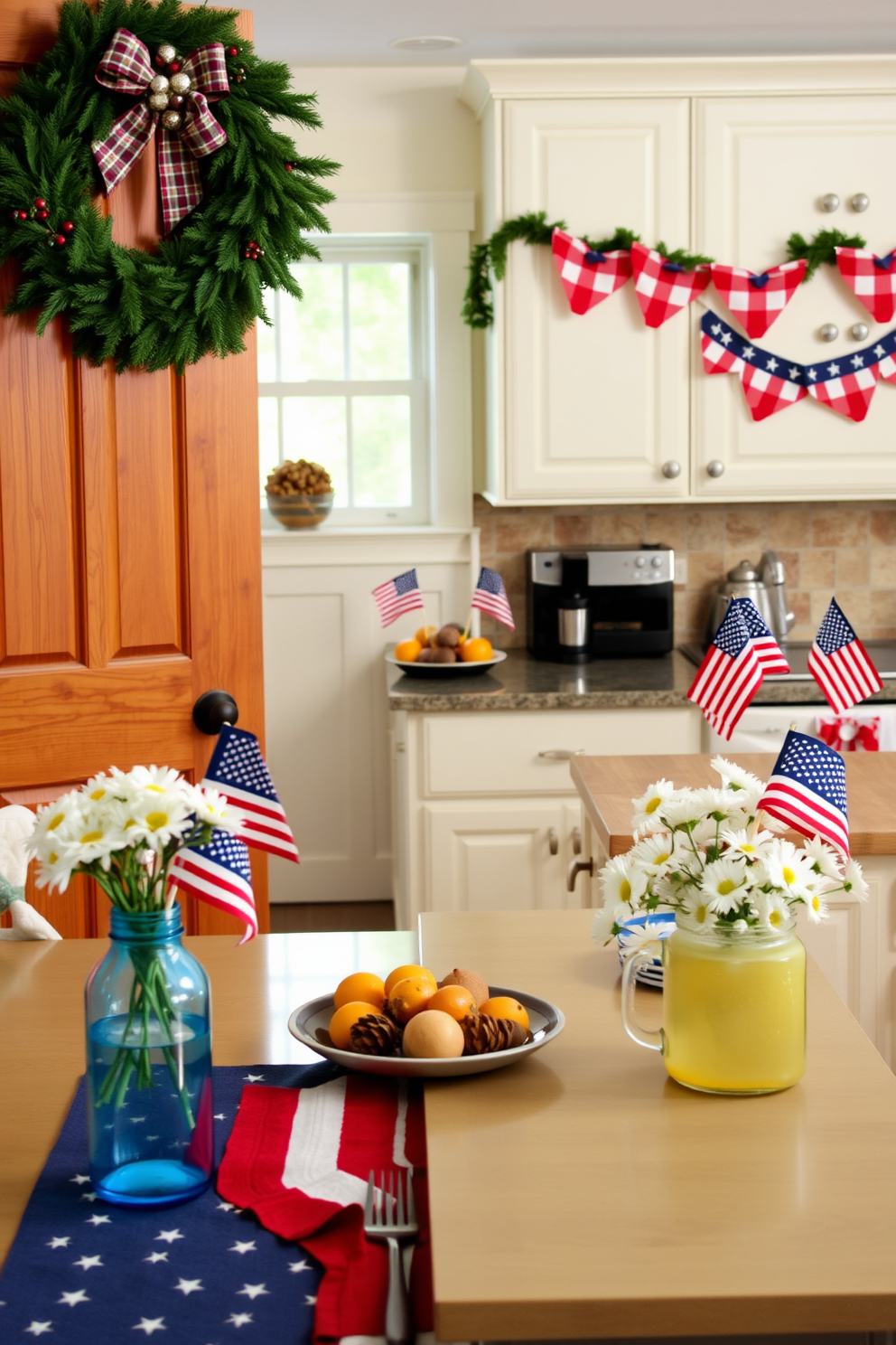 A festive kitchen setting. A green wreath adorned with red berries and a plaid ribbon hangs on the wooden kitchen door. Inside, the kitchen is decorated with holiday-themed dish towels and a centerpiece of pinecones and candles on the island. The cabinets are painted a warm white, and the countertops are clutter-free, except for a bowl of fresh oranges. A Memorial Day-inspired kitchen. Red, white, and blue bunting drapes across the window above the sink, while small American flags are placed in a mason jar on the countertop. The dining table features a patriotic table runner and a bouquet of white daisies in a blue vase. The kitchen island is set with a platter of grilled foods and a pitcher of lemonade, ready for a festive gathering.