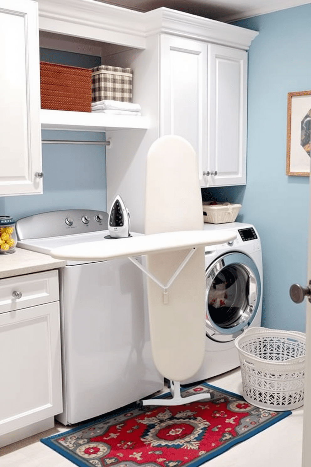 A stylish laundry room featuring a foldable ironing board mounted on the wall, easily accessible yet discreet when not in use. The space is bright and airy, with soft blue walls and white cabinetry that enhances the overall cleanliness and organization of the room. Decorative elements include a vintage-style laundry basket and a vibrant area rug that adds a pop of color to the floor. Shelves above the ironing board hold neatly folded towels and decorative storage boxes, creating a functional yet aesthetically pleasing environment.