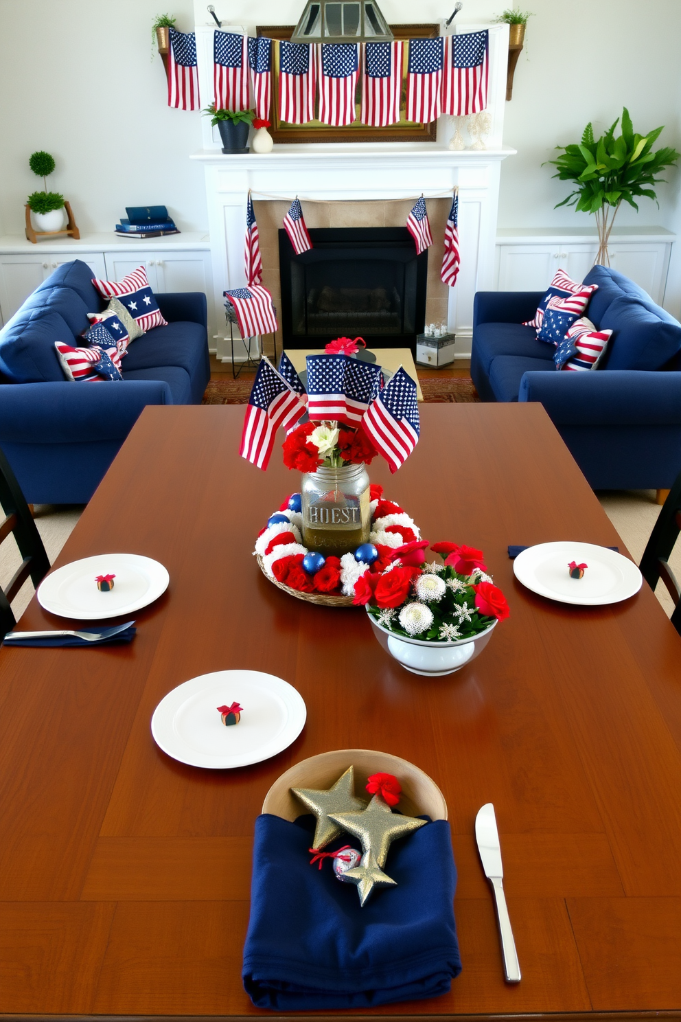 A large wooden dining table is adorned with a centerpiece featuring mini American flags in a rustic mason jar, surrounded by a ring of red, white, and blue flowers. The table is set with classic white dinnerware, silver cutlery, and navy blue napkins, each tied with a small red ribbon. A cozy living room is decorated for Memorial Day with plush navy blue sofas adorned with patriotic-themed throw pillows in red, white, and blue. Above the fireplace, a garland of mini American flags hangs, while the coffee table features a decorative bowl filled with star-shaped ornaments and a small bouquet of red carnations.