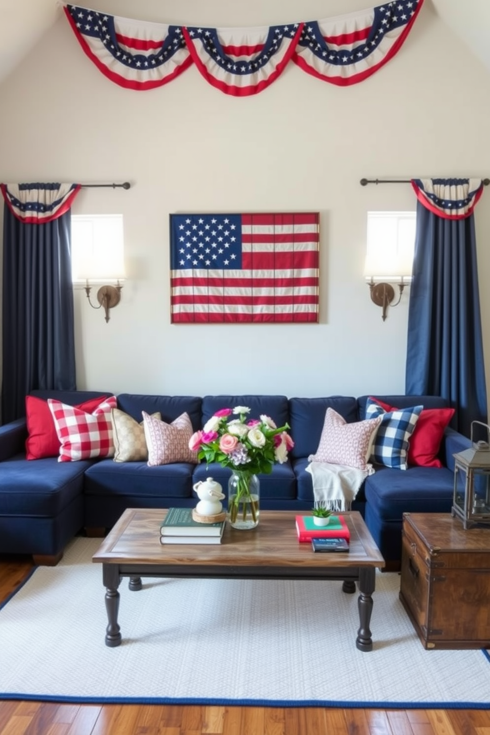 A cozy living room adorned with Memorial Day decorations. On the main wall, a large star-spangled banner wall art takes center stage, framed by two elegant sconces. The room features a comfortable, navy blue sectional sofa with red and white throw pillows. A rustic coffee table sits atop a light-colored area rug, with a vase of fresh flowers and a stack of patriotic-themed books. American flag bunting hangs above the windows, and a vintage wooden trunk serves as a side table, holding a decorative lantern and a small potted plant.